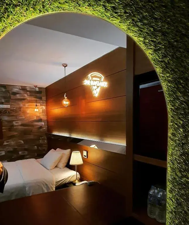 Bed in Friendly DH Naissance Hotel by Mindrum Group Bed in Friendly DH Naissance Hotel by Mindrum Group