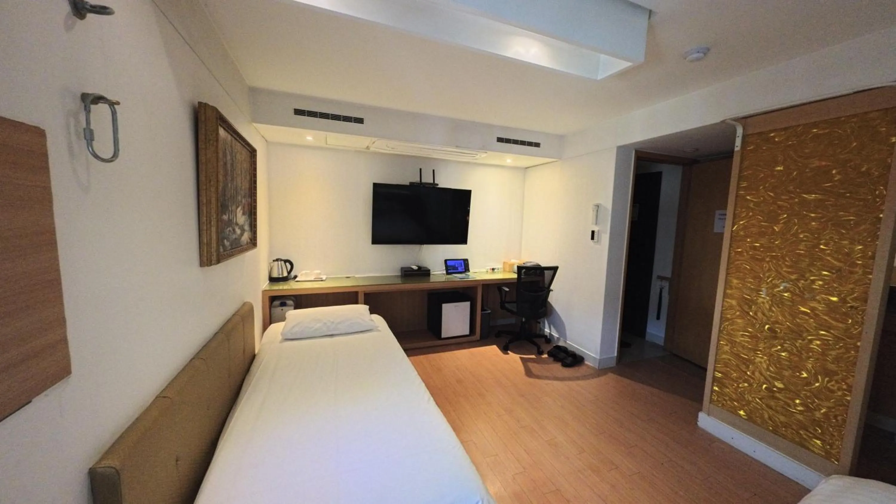 Bed in Friendly DH Naissance Hotel by Mindrum Group