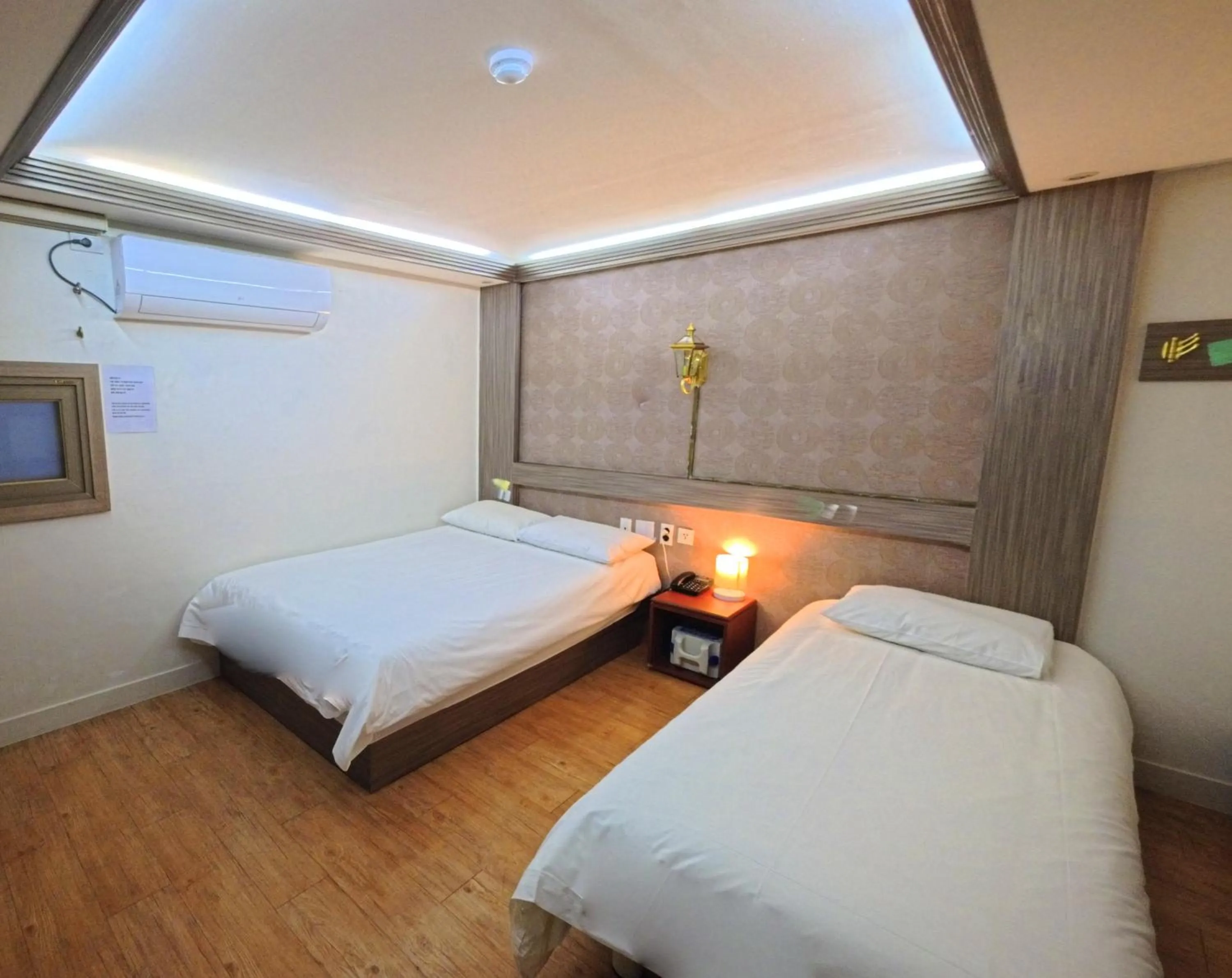 Bed in Friendly DH Naissance Hotel by Mindrum Group