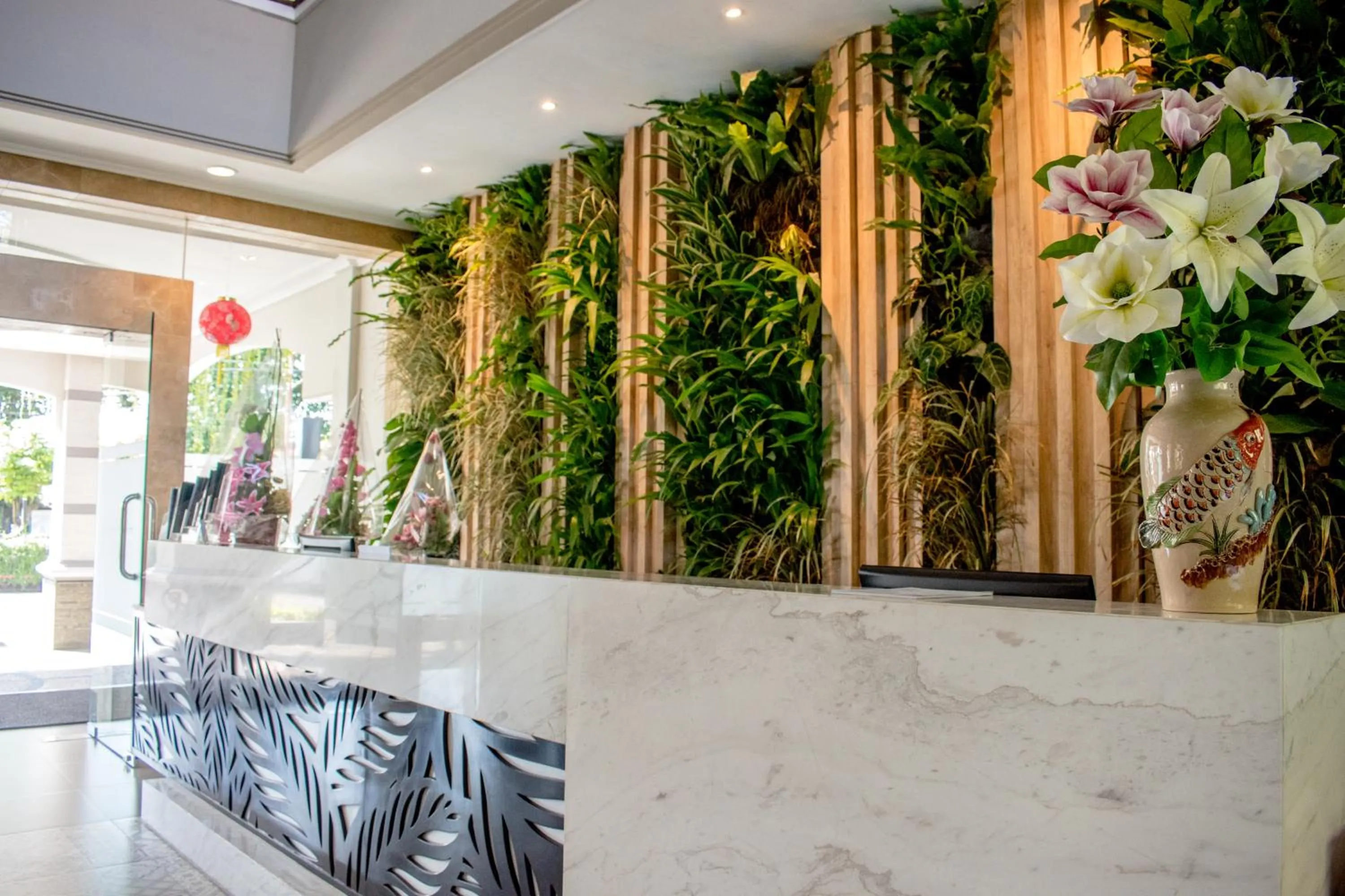 Lobby or reception in Luminor Hotel Jember By WH