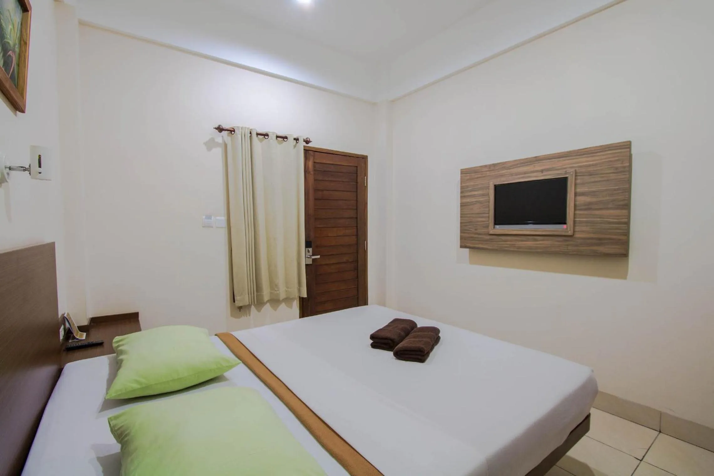 Bed in Central Inn Senggigi