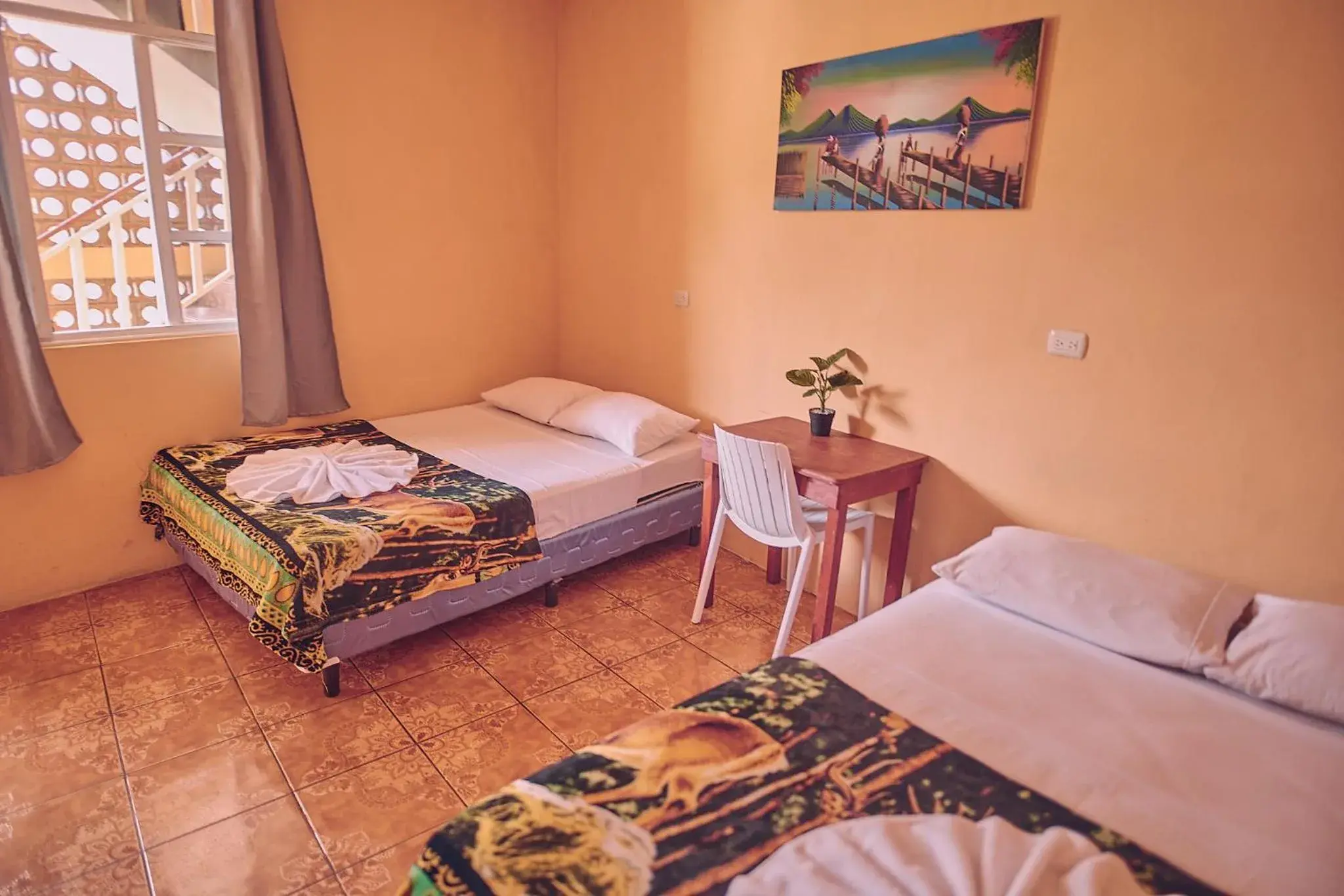 Quadruple Room with Private Bathroom in Amigos Quadruple Room with Private Bathroom in Amigos