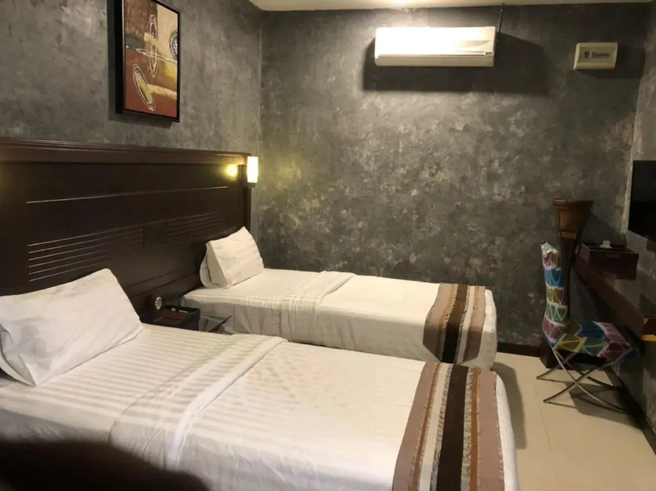 Bed in GM Hotel Bed in GM Hotel