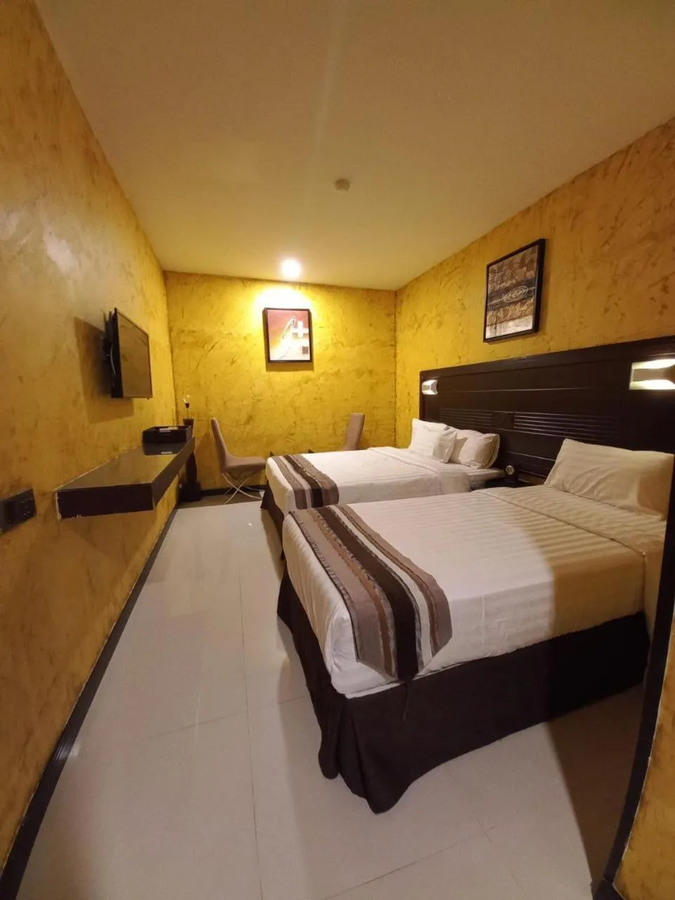 Photo of the whole room, Bed in GM Hotel