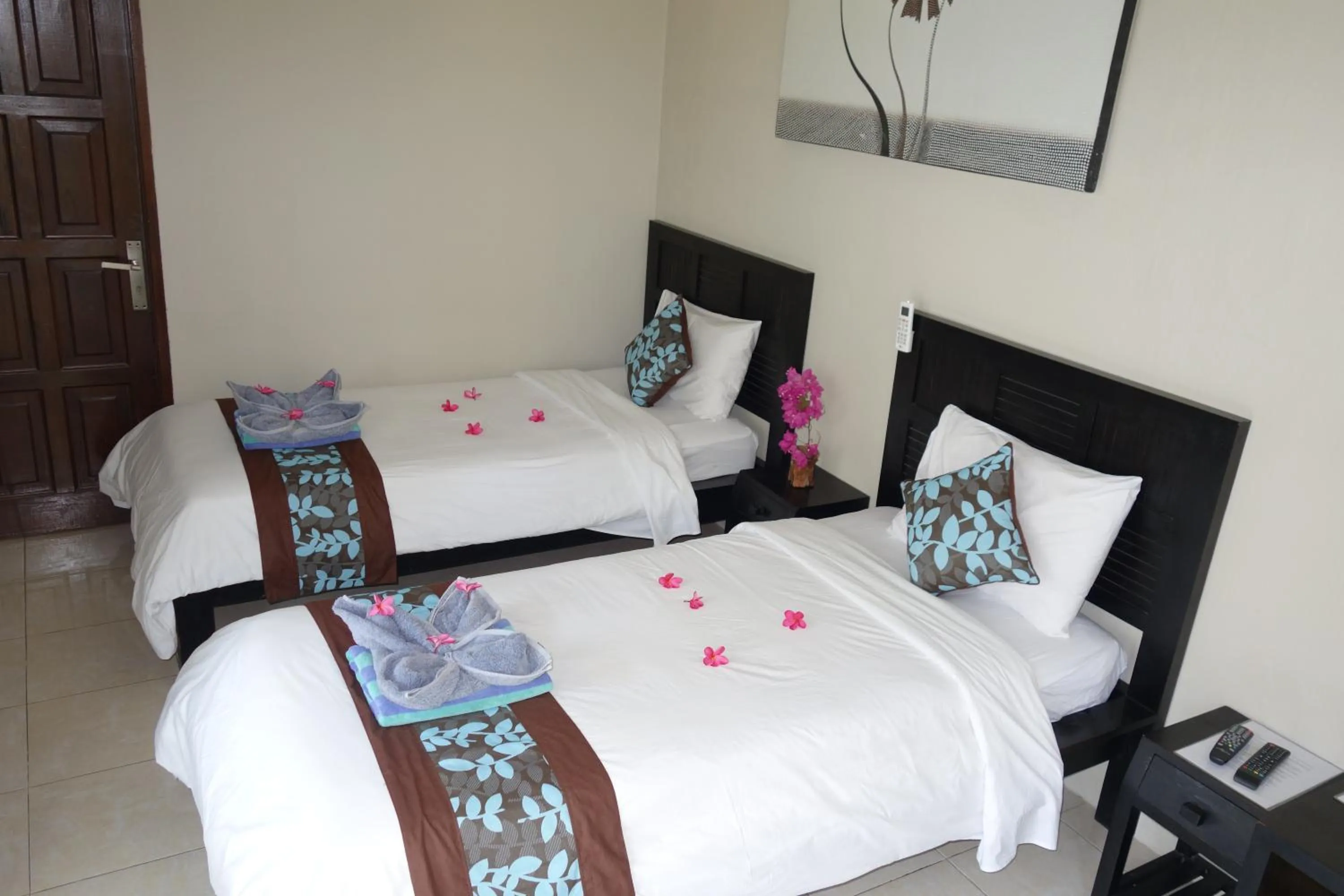 Bed in Gili Palms Resort