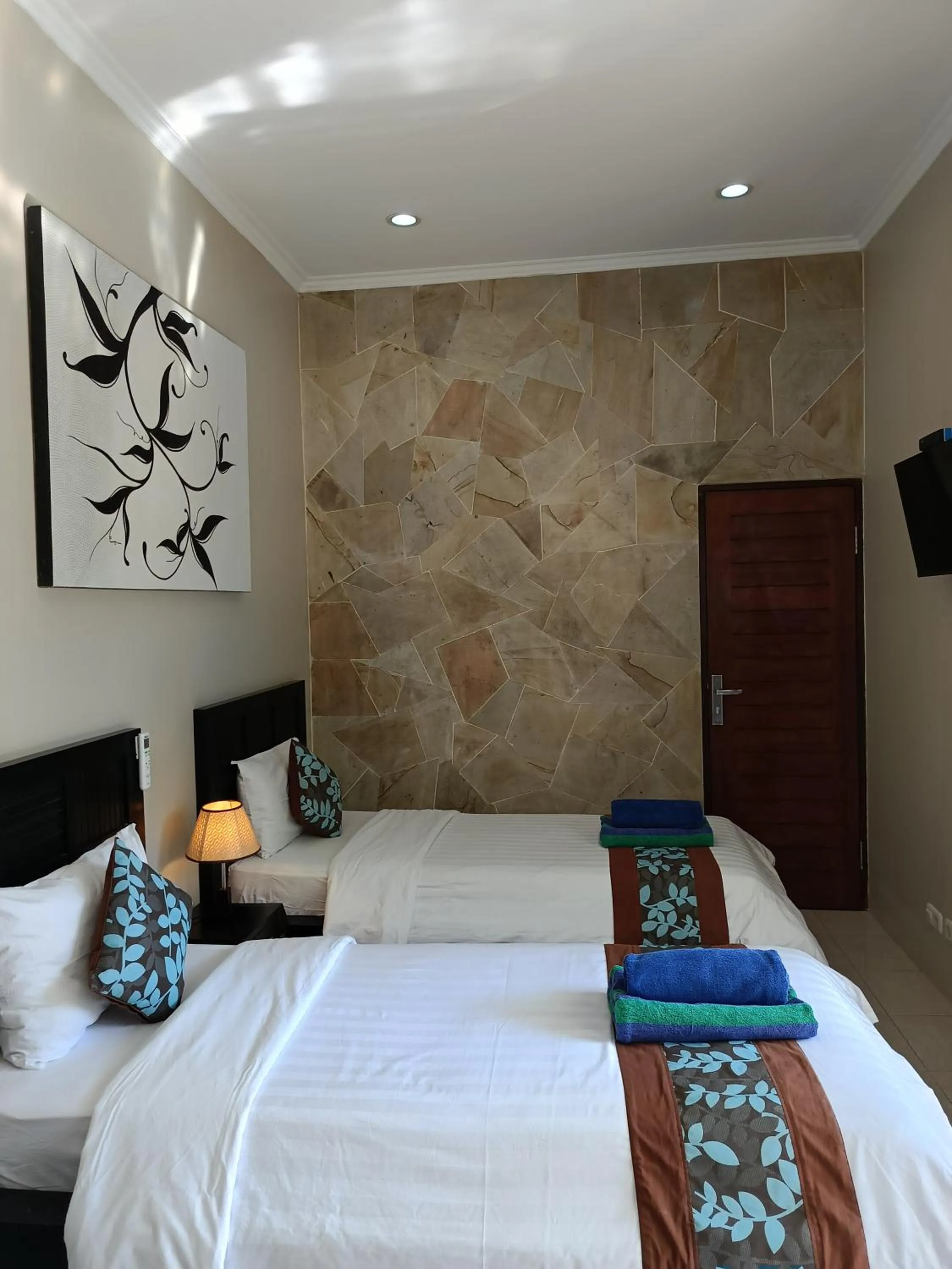Bed in Gili Palms Resort