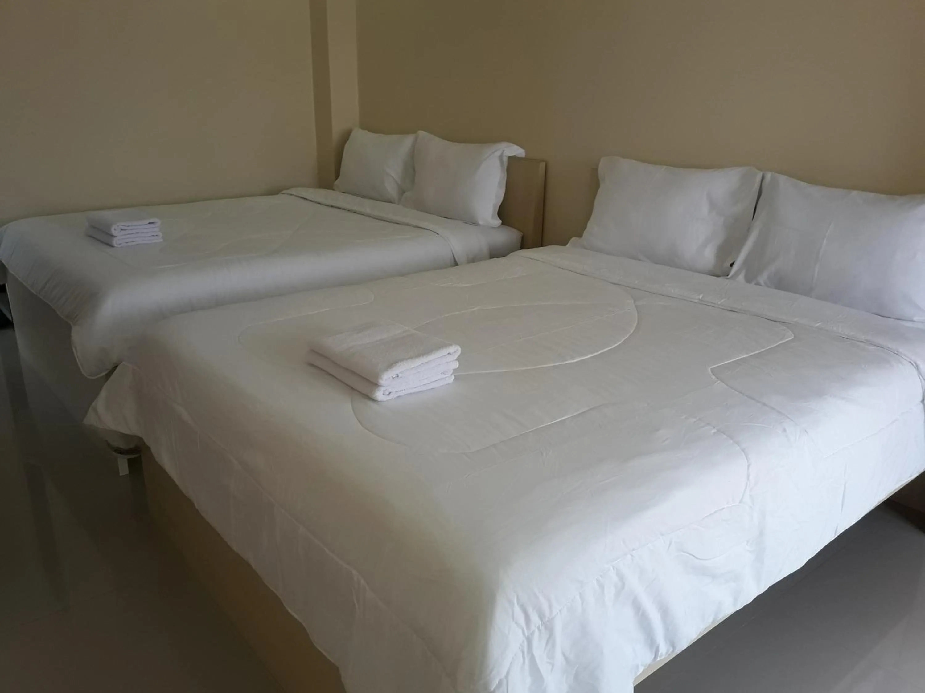 Bed in Toraja Lodge Guest House