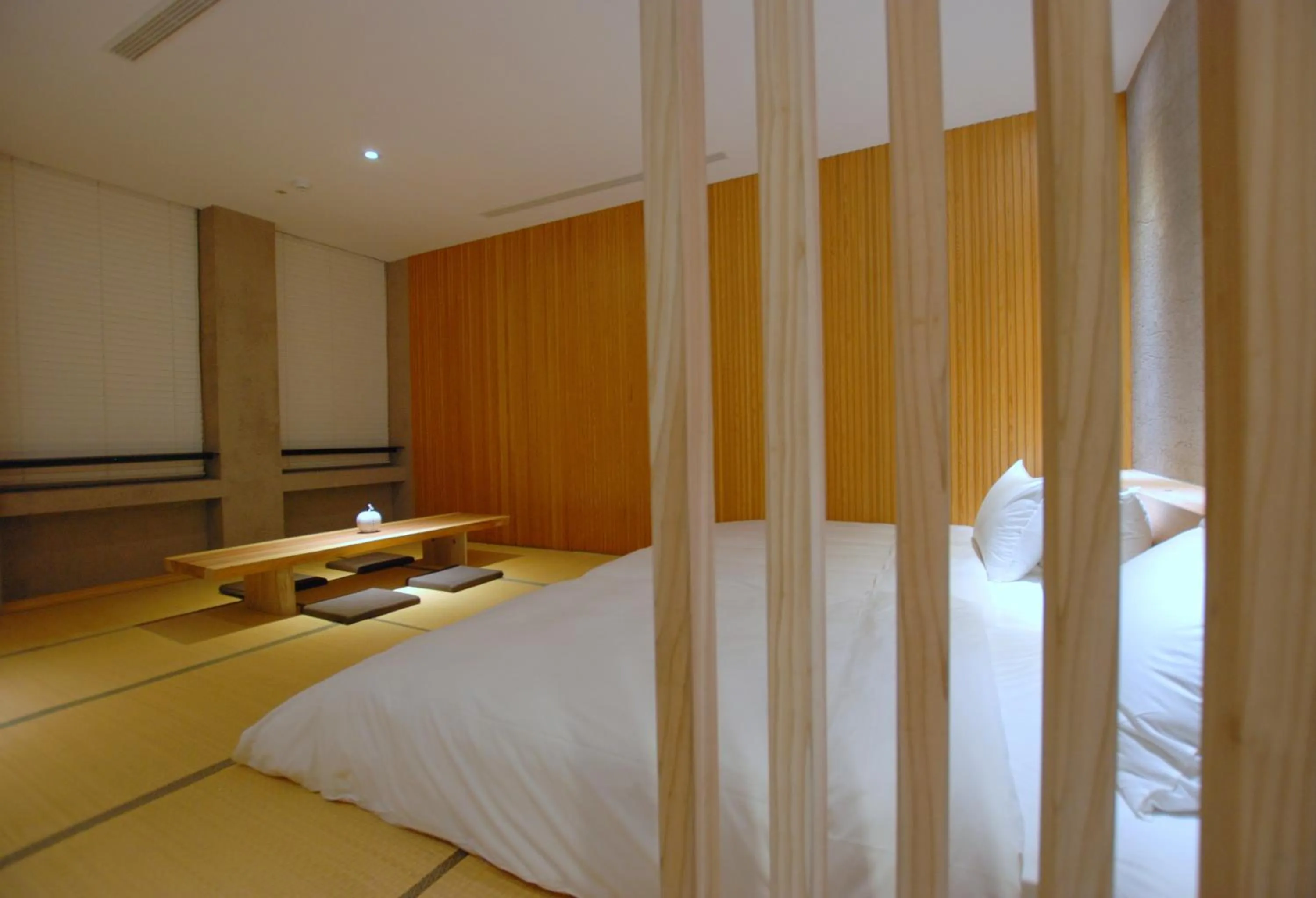 Bed in 小小邸 Small Hotel