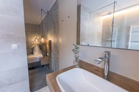 Bathroom, Bed in LakeSide Apartments Seefeld