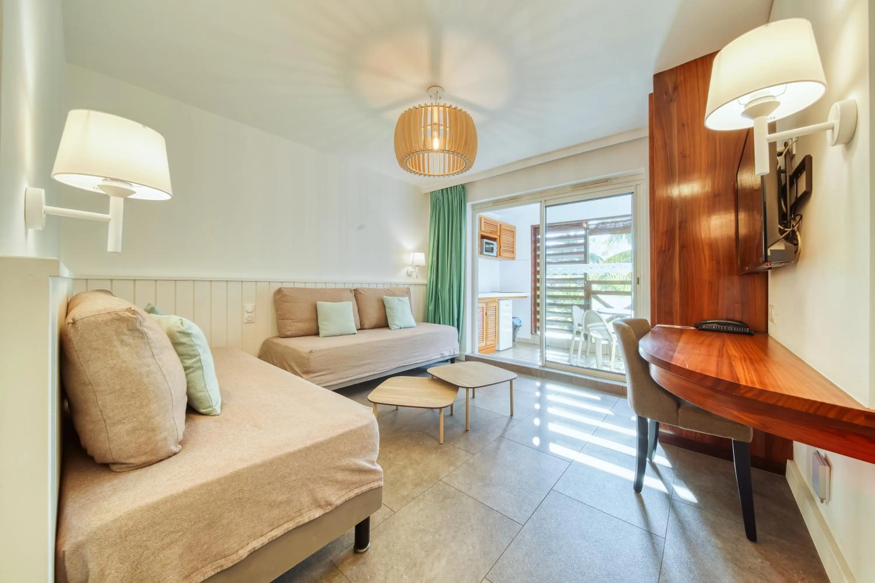 Seating area, Bed in Résidence Tropic Appart Hotel