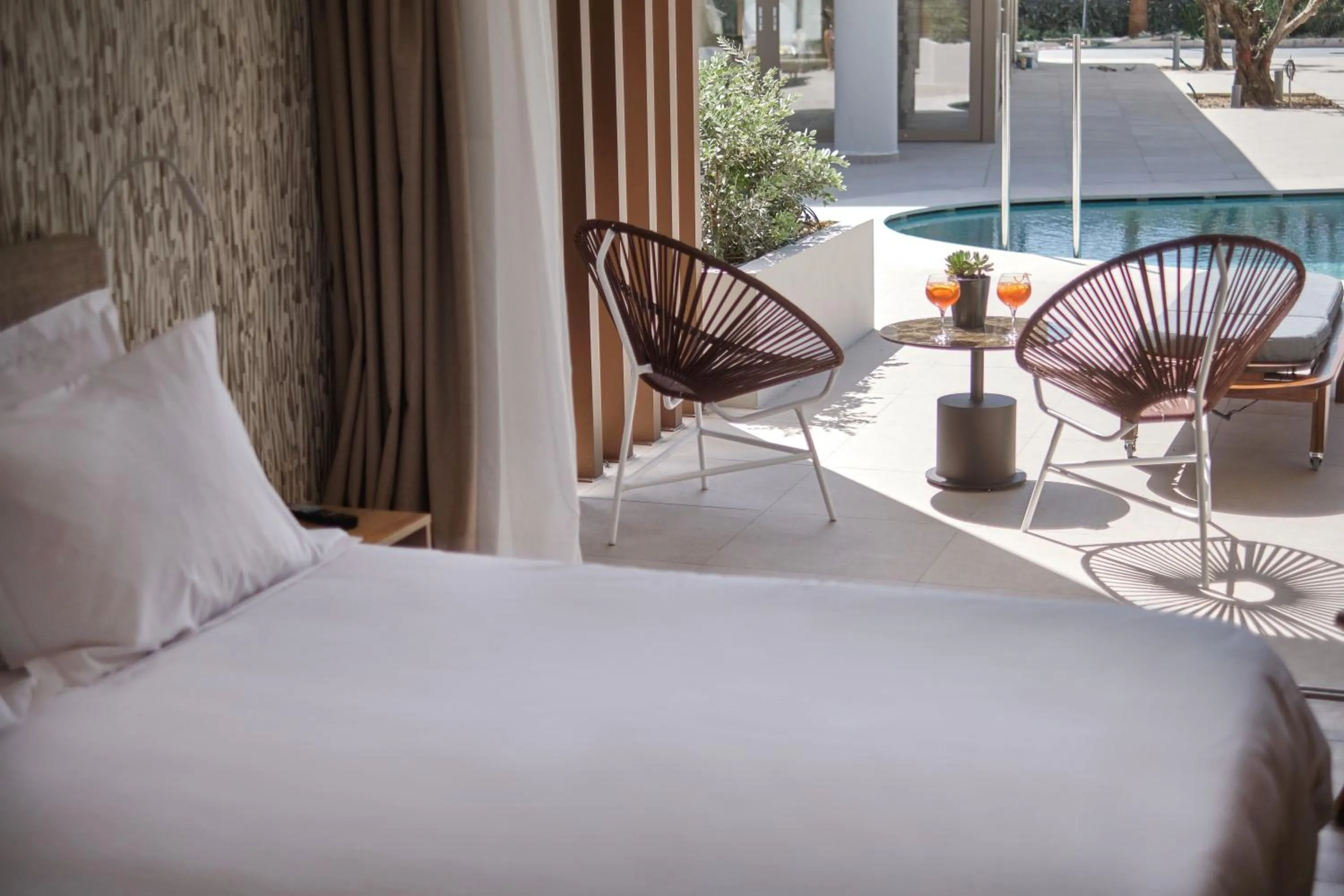 Seating area, Bed in Utopia Blu Hotel