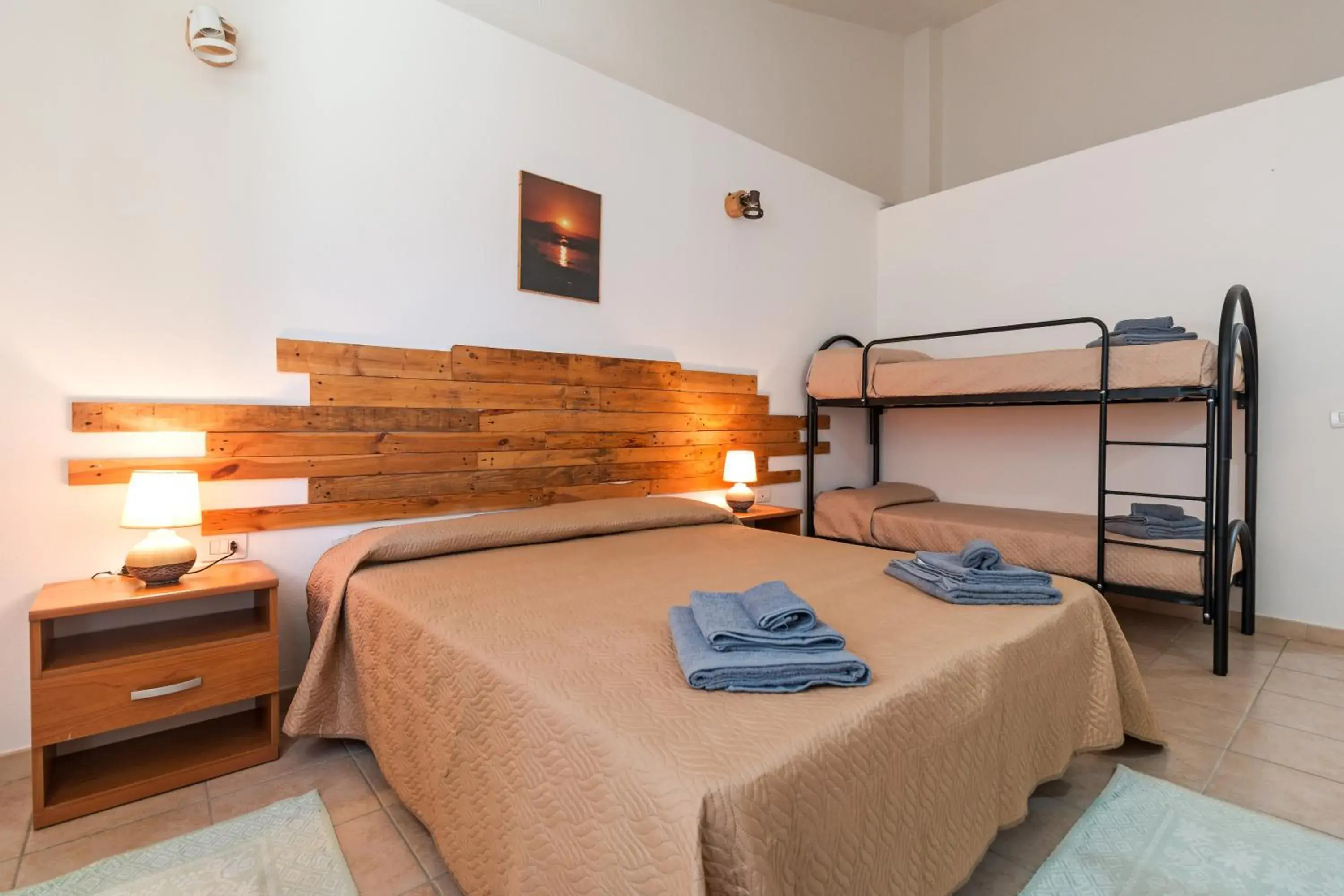 Deluxe Quadruple Room in Ristoro Norghio Deluxe Quadruple Room in Ristoro Norghio