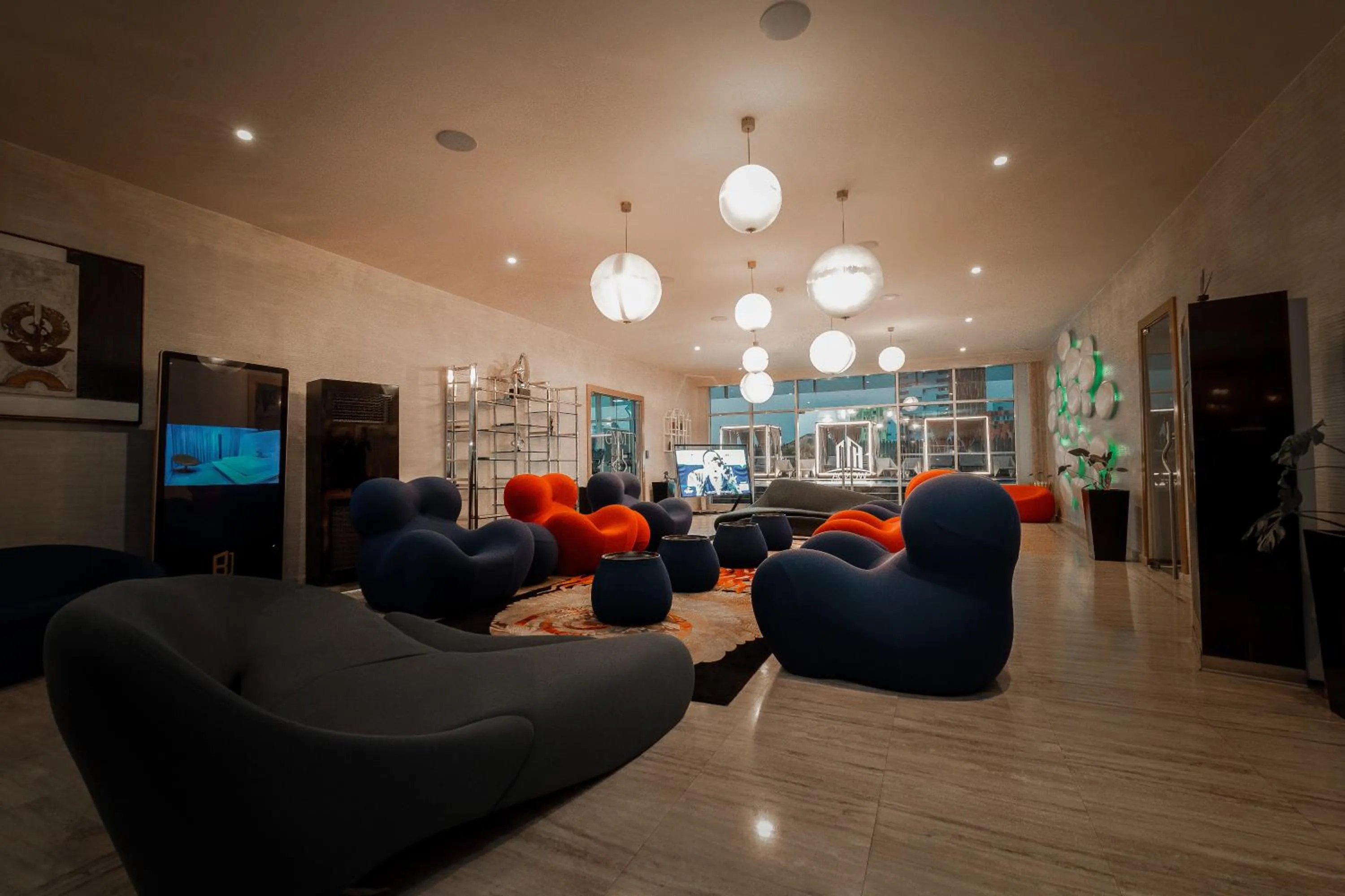 Communal lounge/ TV room in Kwarleyz Residence, Accra