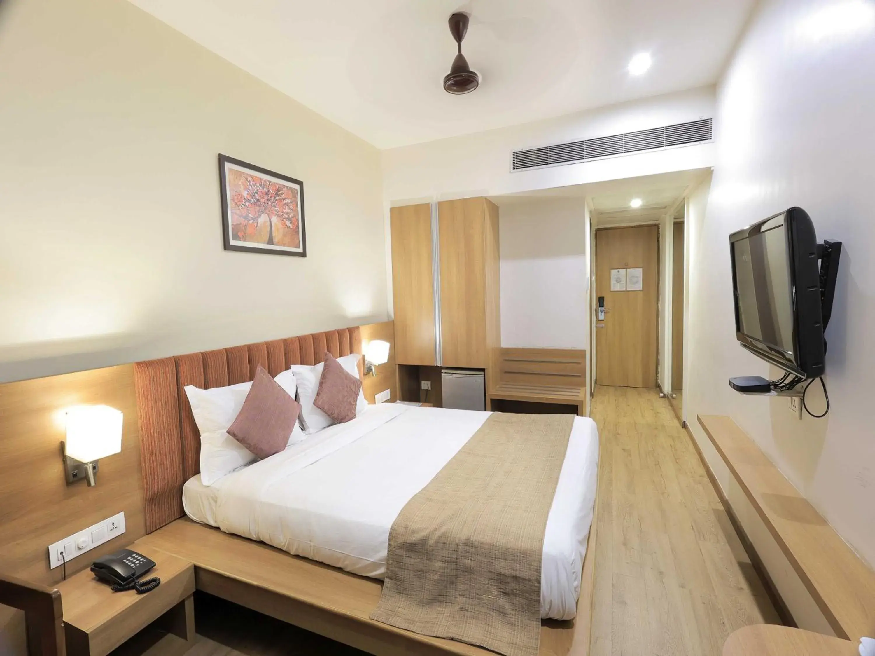 Classic Triple Room - single occupancy in Palette Hotel Surya by CheckIn, Vadodara Classic Triple Room - single occupancy in Palette Hotel Surya by CheckIn, Vadodara