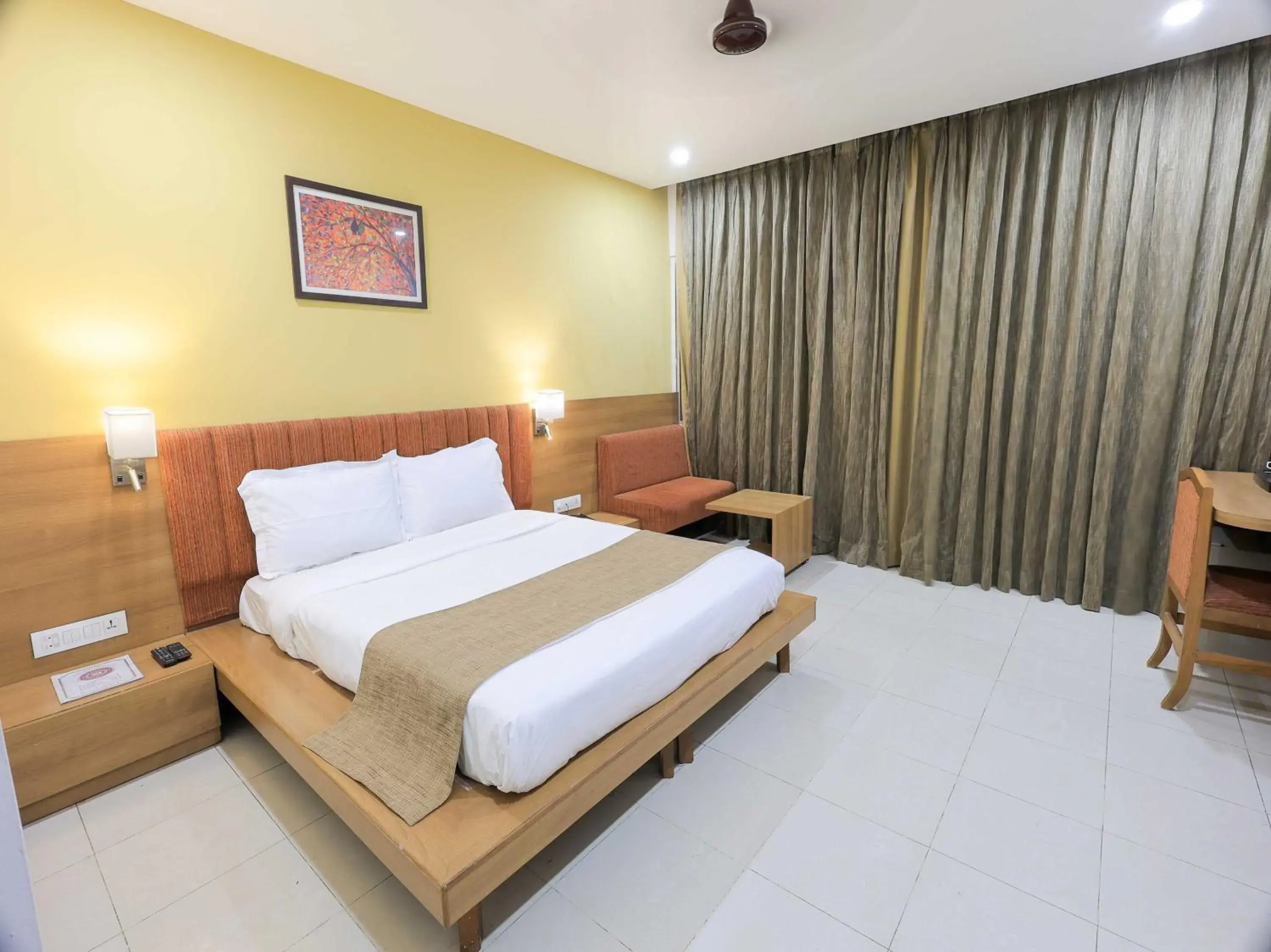 Classic Triple Room - single occupancy in Palette Hotel Surya by CheckIn, Vadodara Classic Triple Room - single occupancy in Palette Hotel Surya by CheckIn, Vadodara