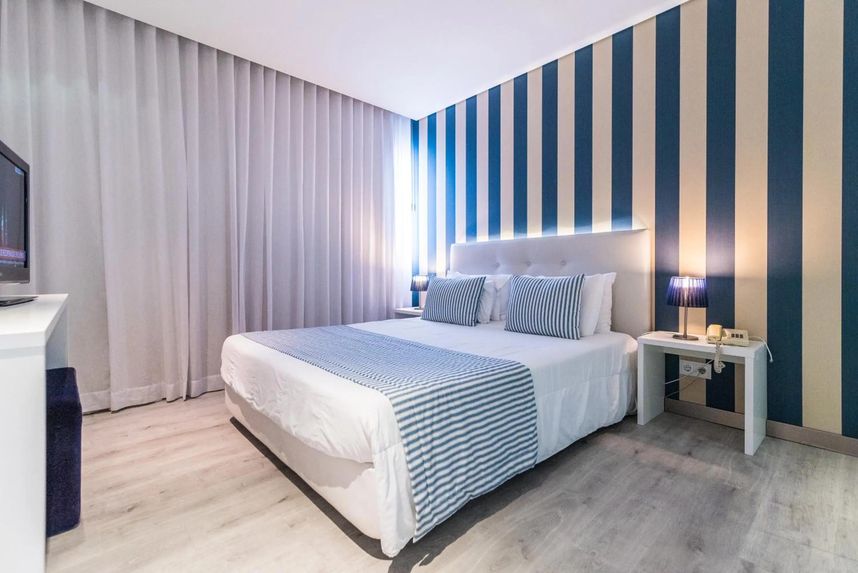 Photo of the whole room, Bed in Costa de Prata Hotel