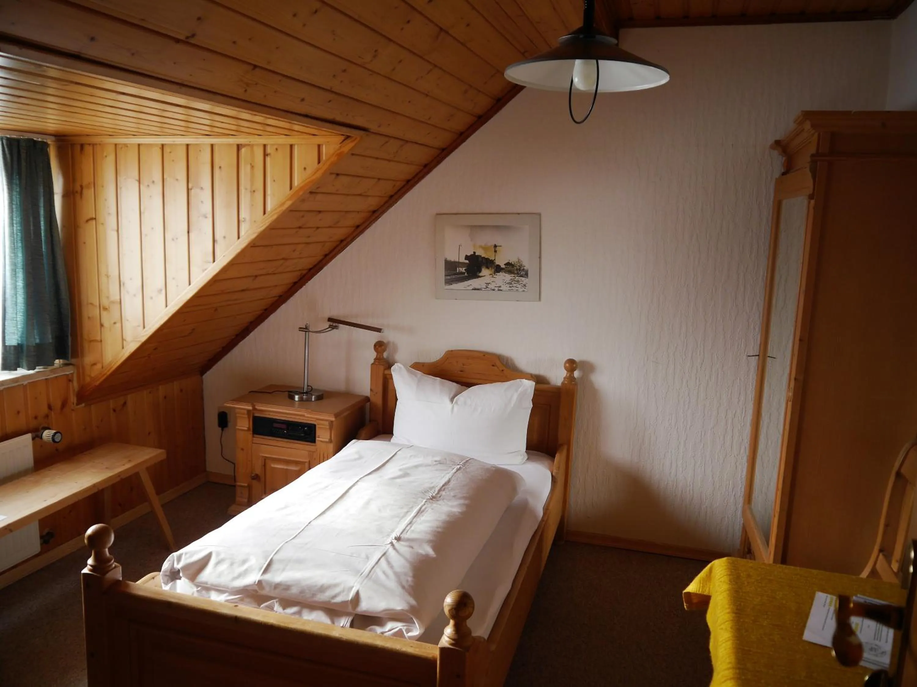 Photo of the whole room, Bed in Hotel-Gasthof-Destille-Eisenbahn