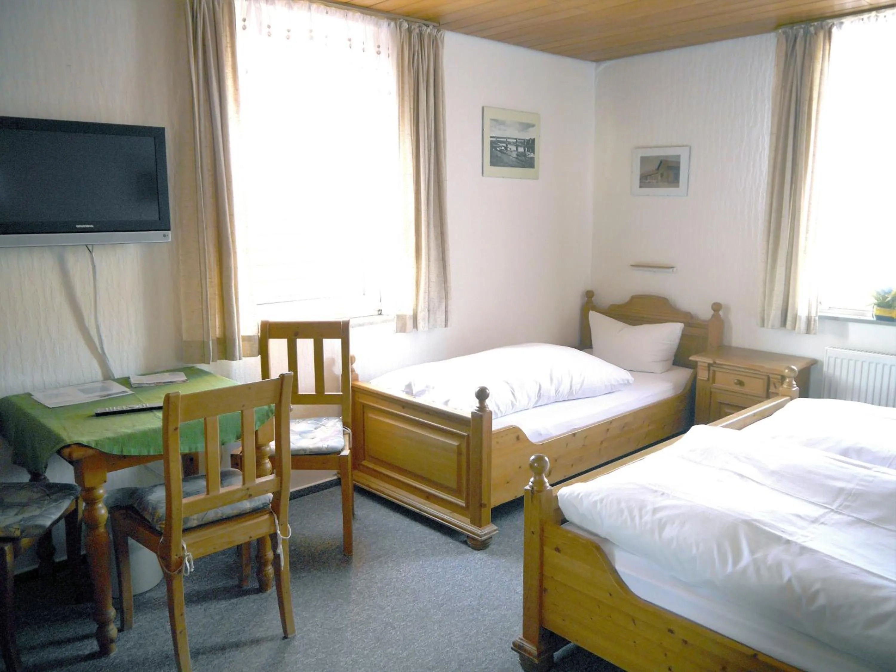 Photo of the whole room, Bed in Hotel-Gasthof-Destille-Eisenbahn
