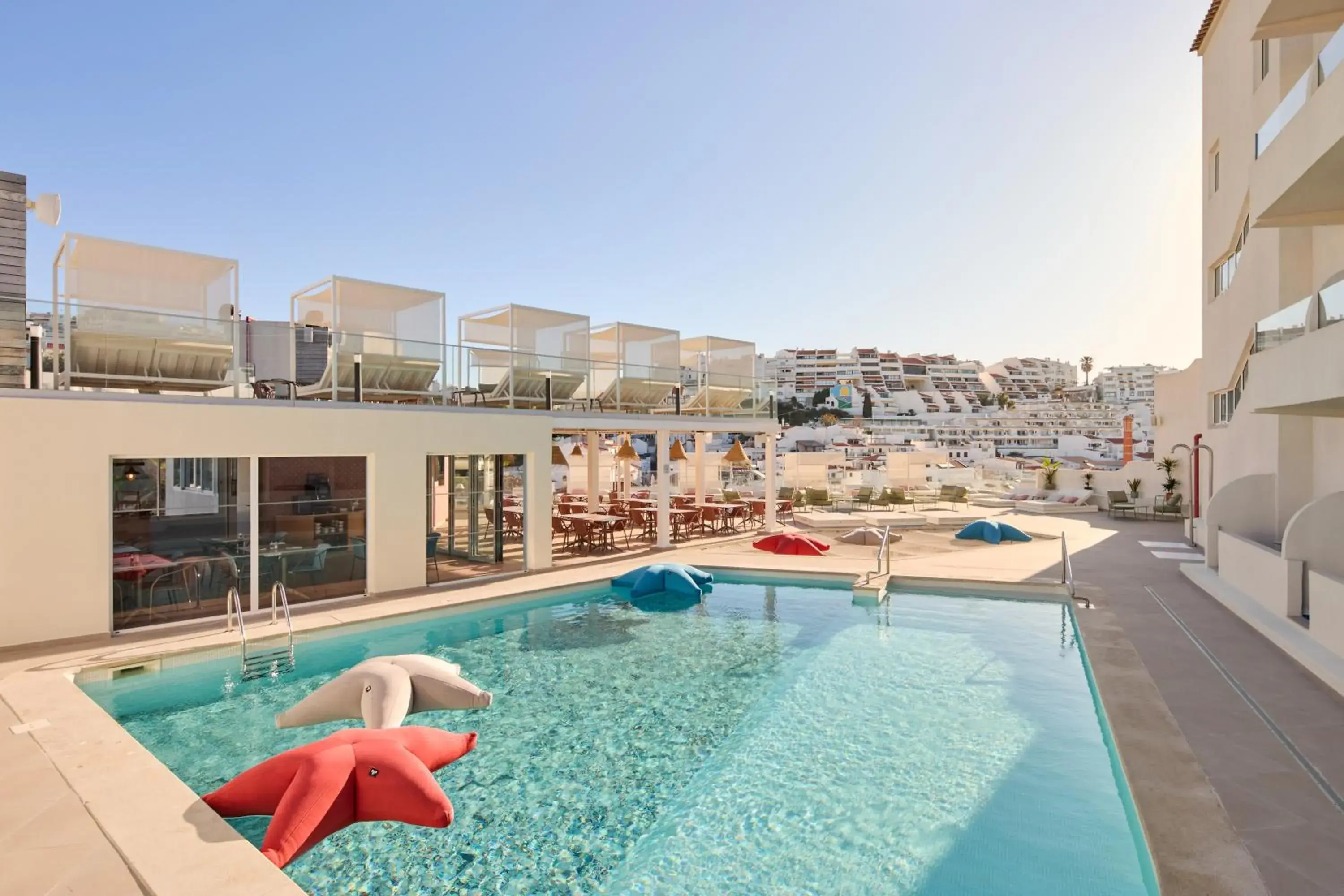 Swimming pool in Hotel Indigo Albufeira by IHG Swimming pool in Hotel Indigo Albufeira by IHG