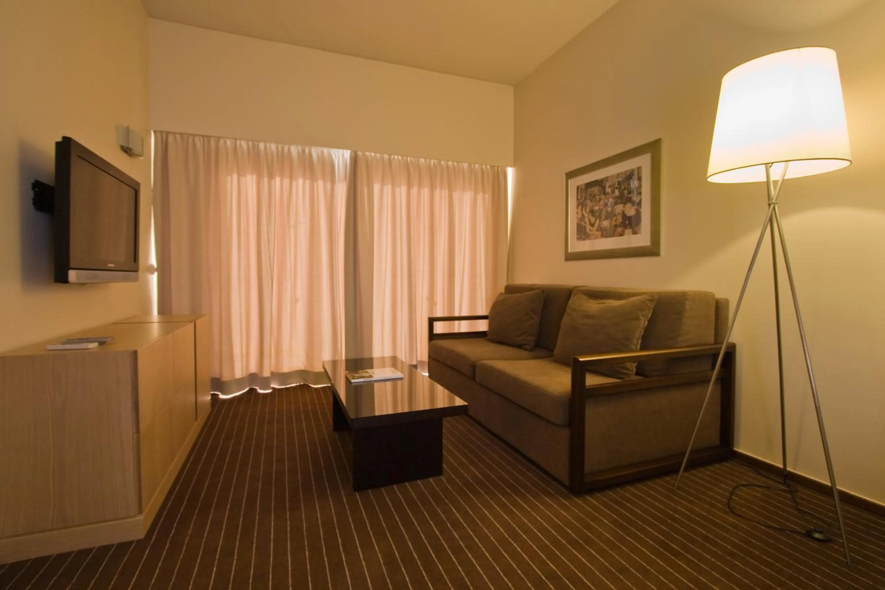 Living room in Hotel Girassol - Suite Hotel