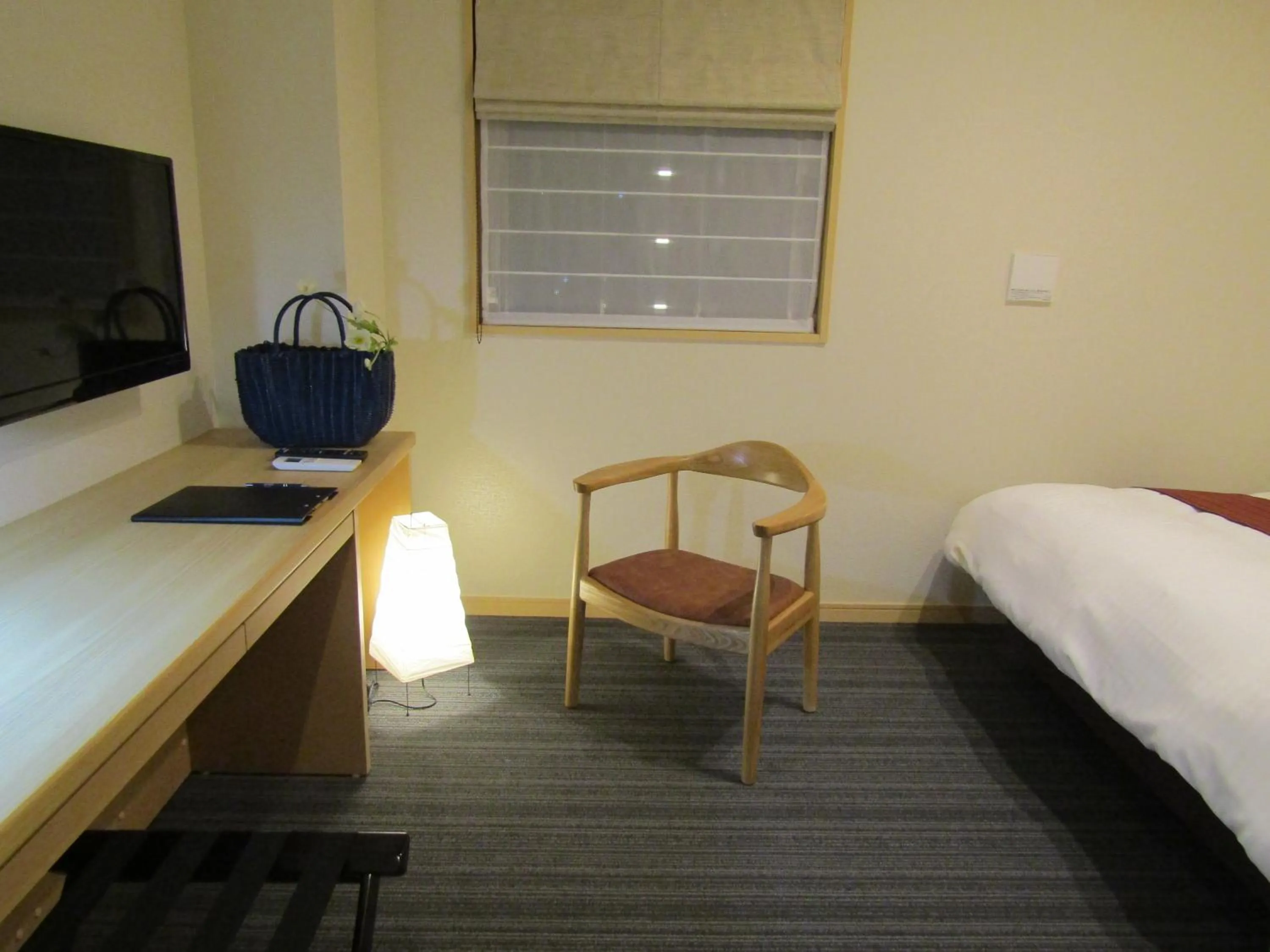 Living room, Bed in Japanese Style Hotel Isomura