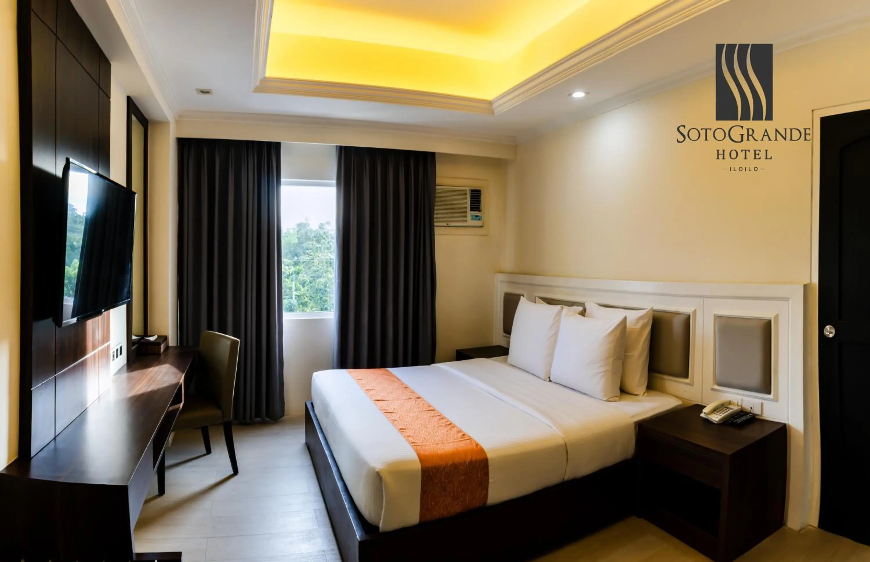 Bed in Sotogrande Iloilo Hotel