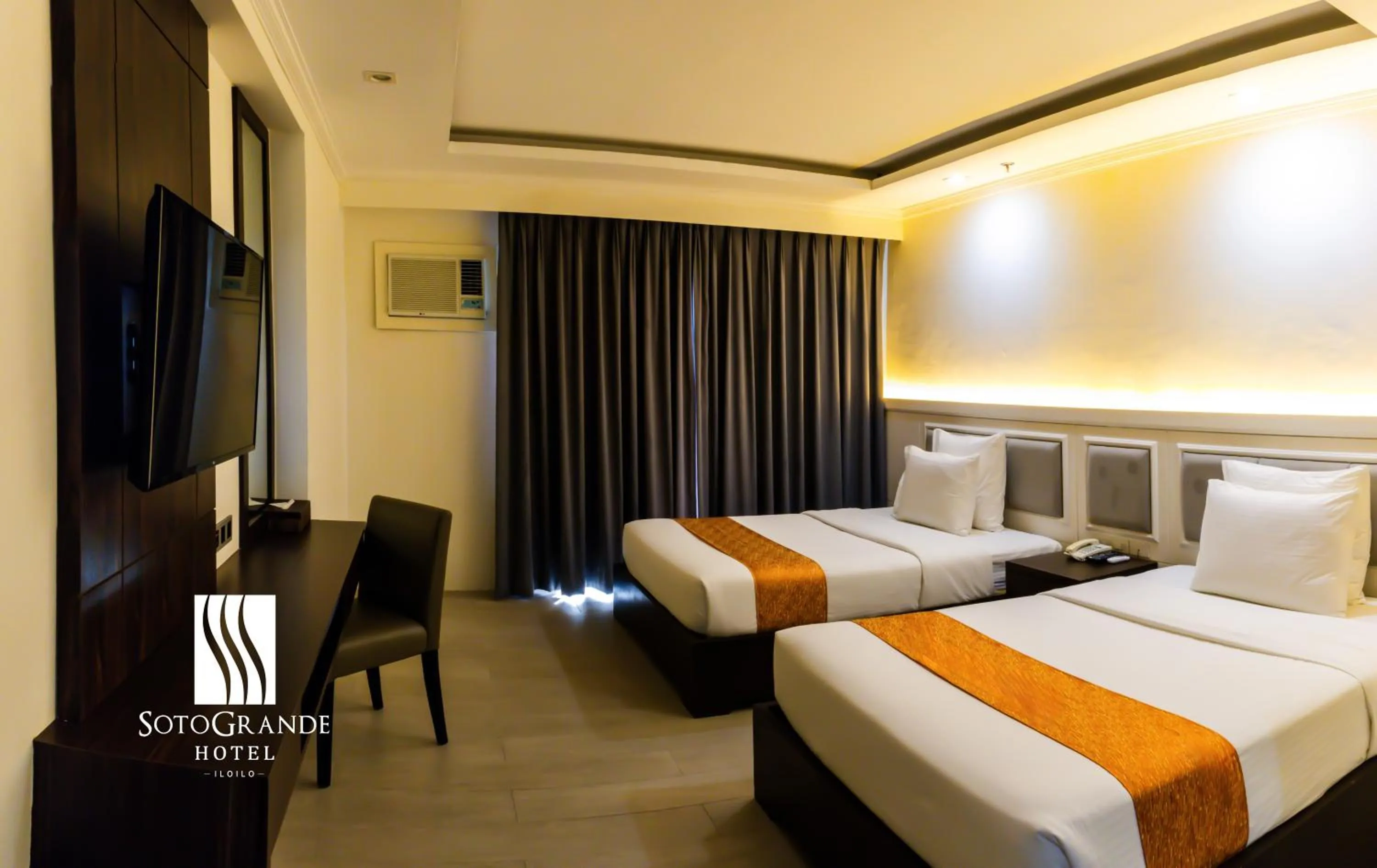 Photo of the whole room, Bed in Sotogrande Iloilo Hotel