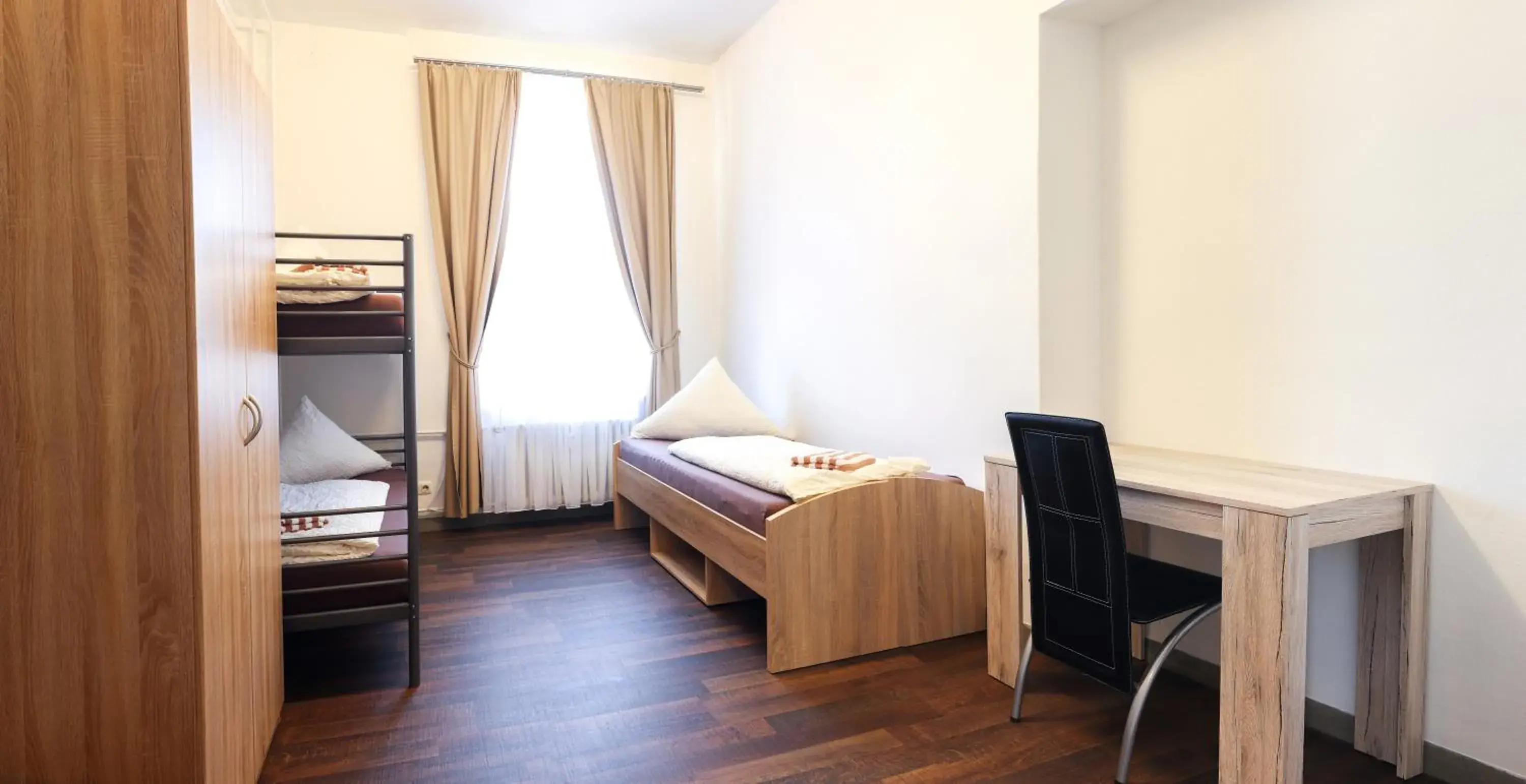 Triple Room with Shared Bathroom in FMM Hostel Triple Room with Shared Bathroom in FMM Hostel