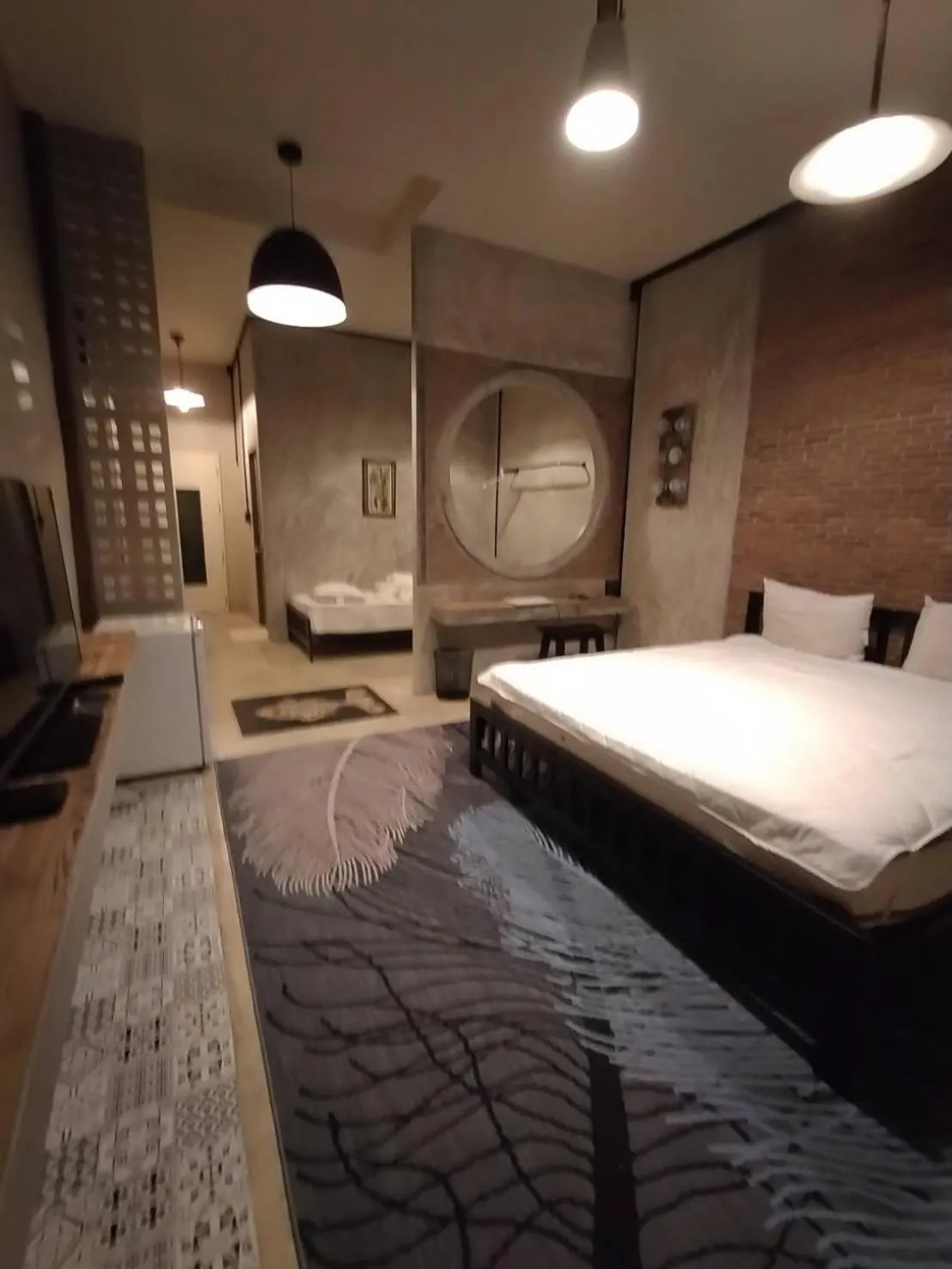 Bed in Baan Hotelier Resort