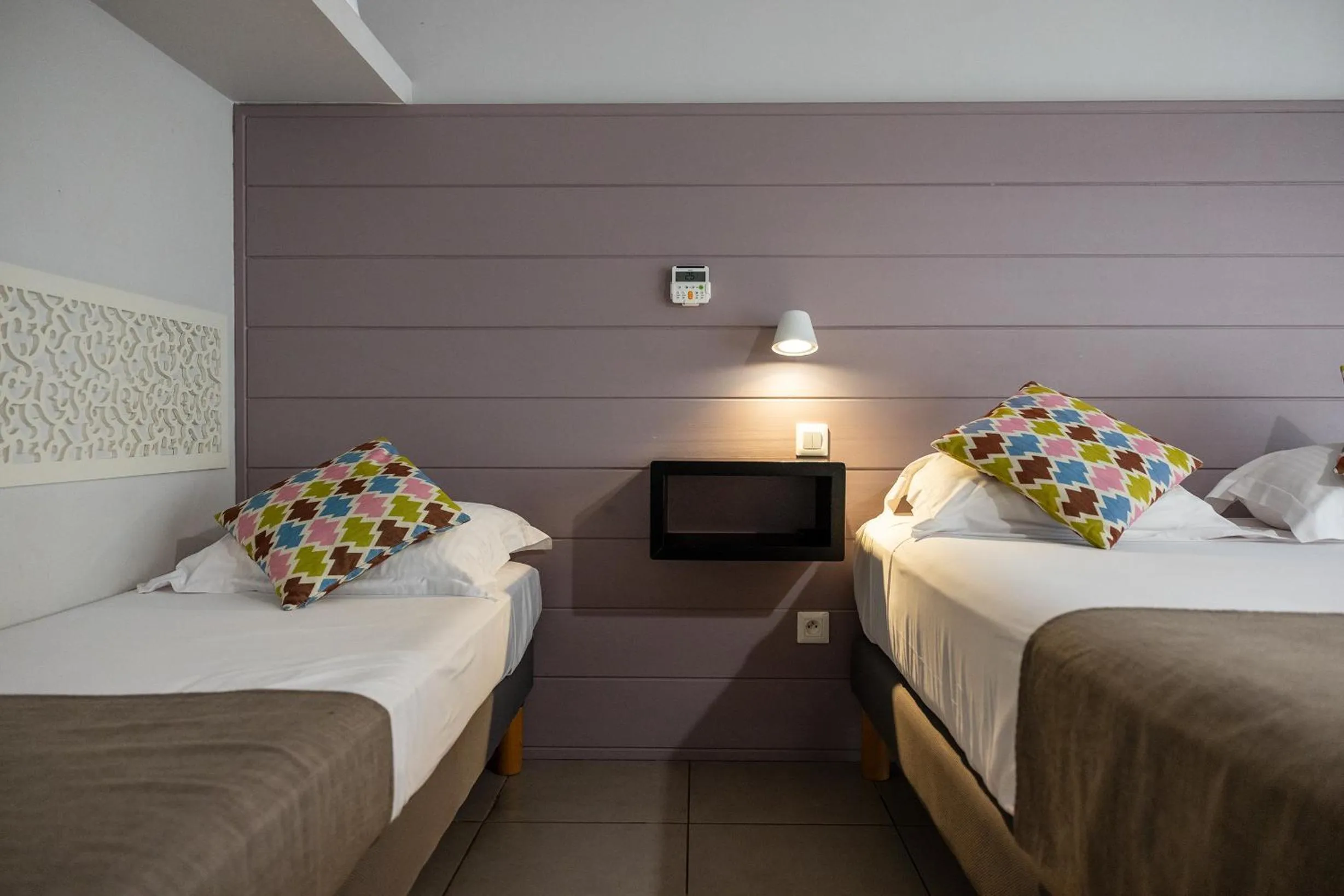 Bed in Résidence l'Archipel