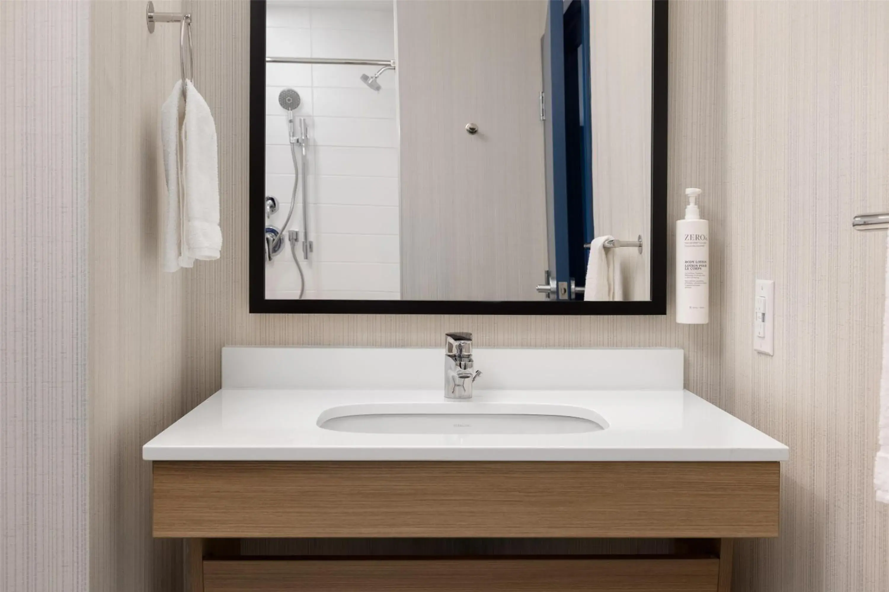 Bathroom in Spark By Hilton Woodstock Bathroom in Spark By Hilton Woodstock