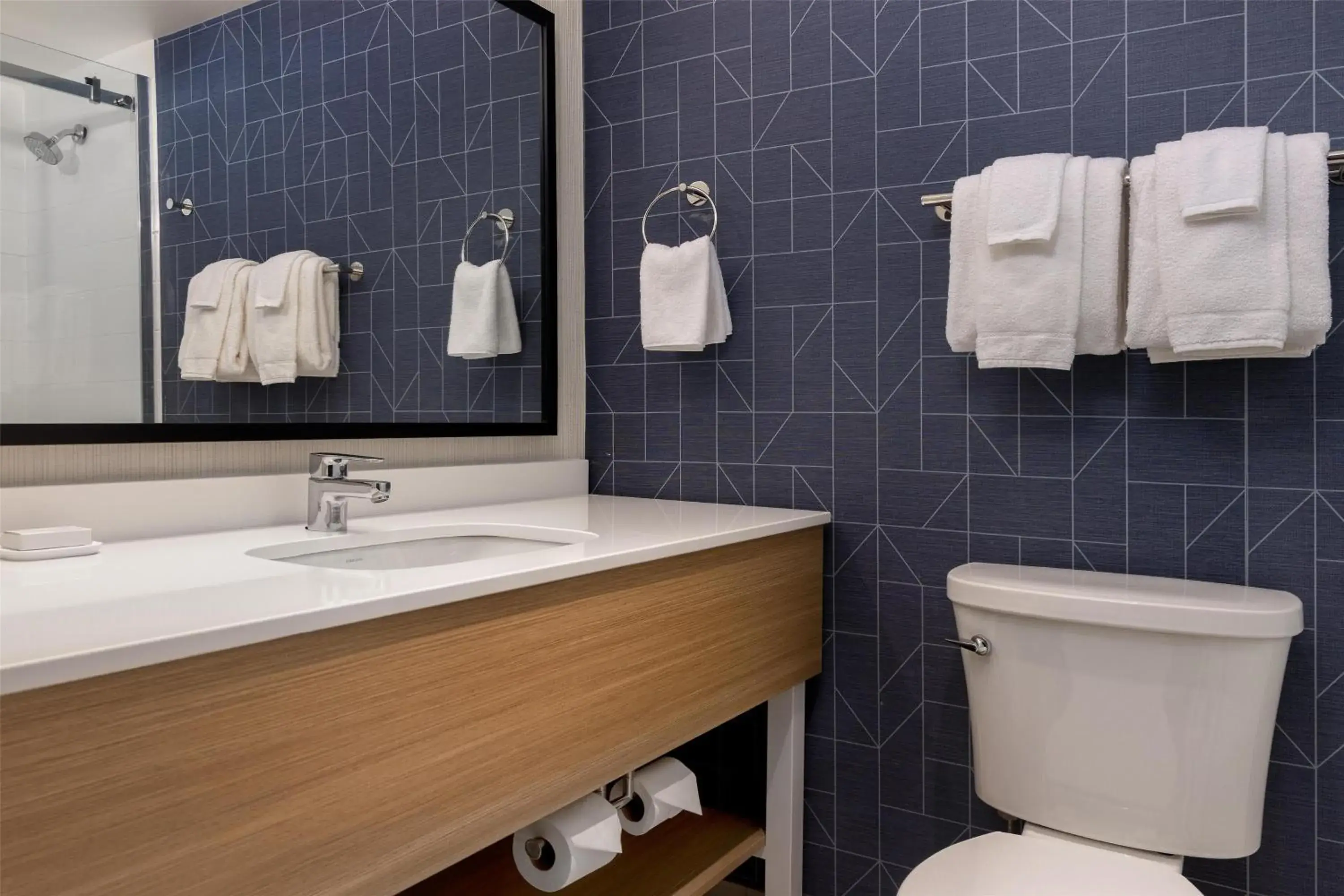 Bathroom in Spark By Hilton Woodstock Bathroom in Spark By Hilton Woodstock