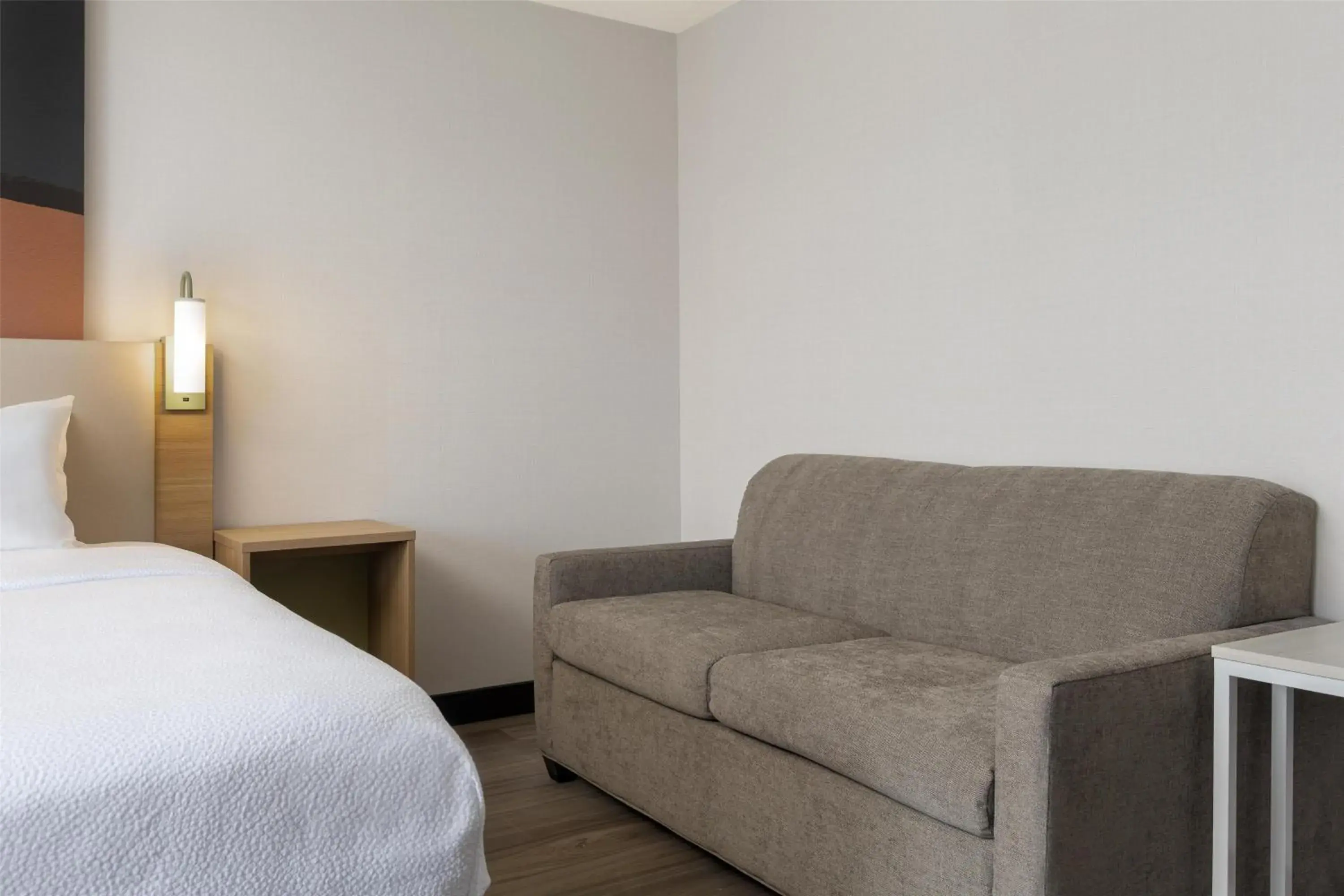 Living room, Bed in Spark By Hilton Woodstock Living room, Bed in Spark By Hilton Woodstock