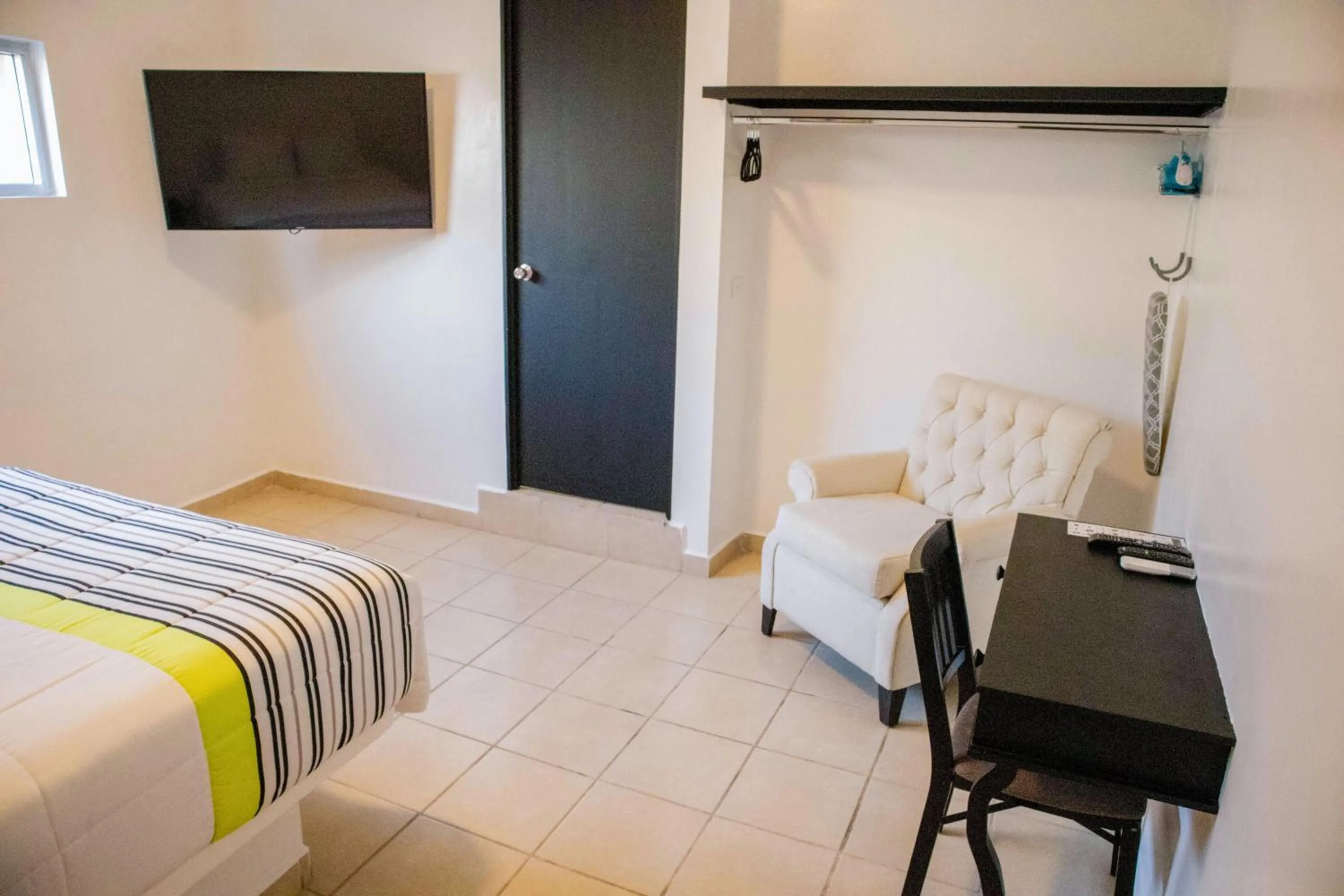 TV and multimedia, Bed in Donjuan By Melida Hotel