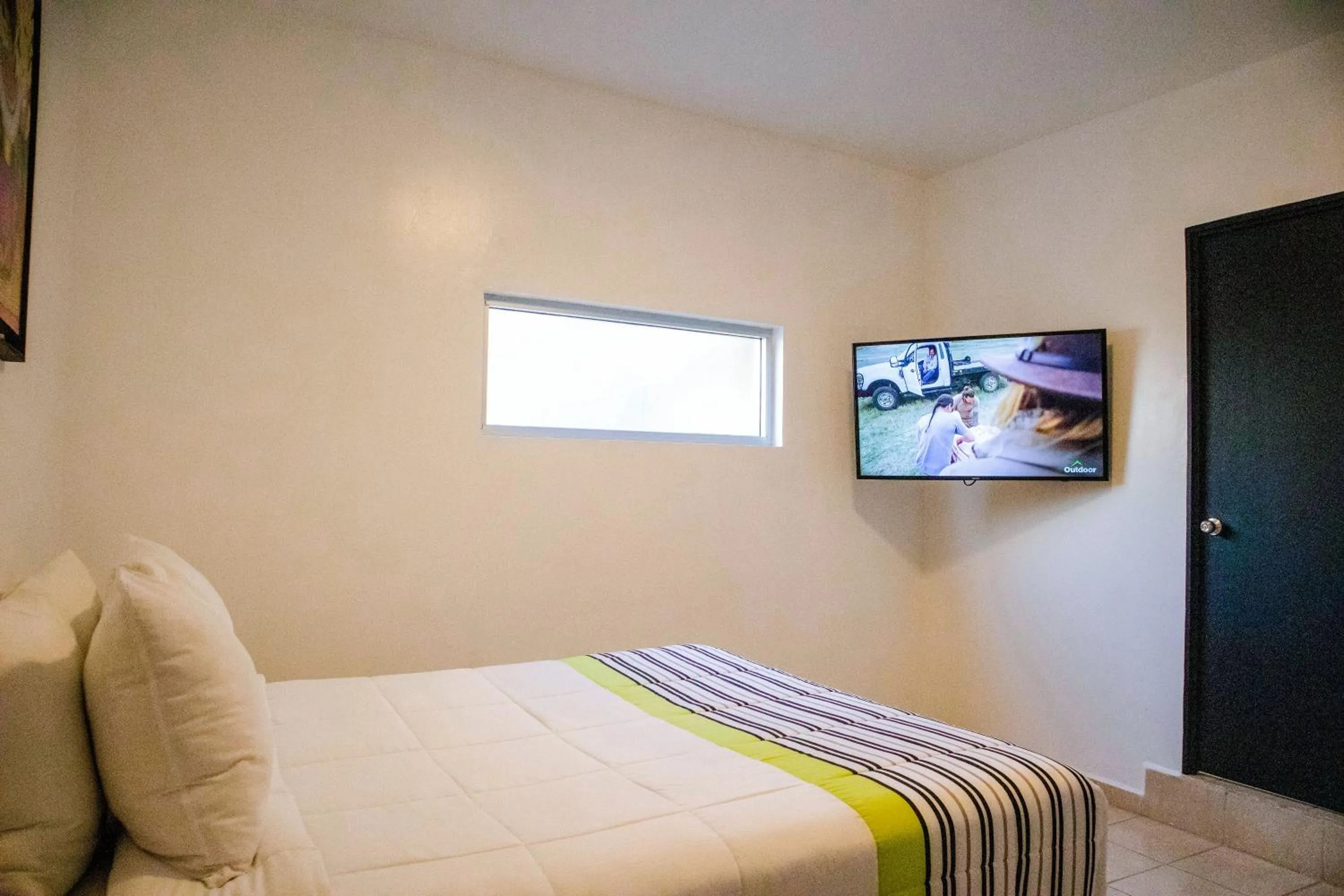 TV and multimedia, Bed in Donjuan By Melida Hotel