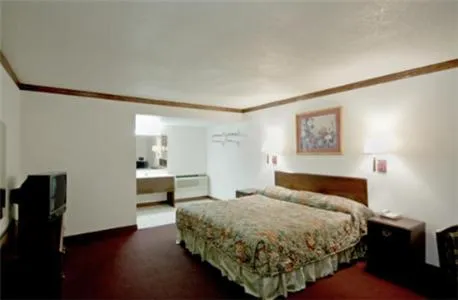Bed in Executive Inn Muldrow