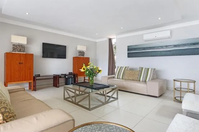 Communal lounge/ TV room in Vetho House Villa Ballito
