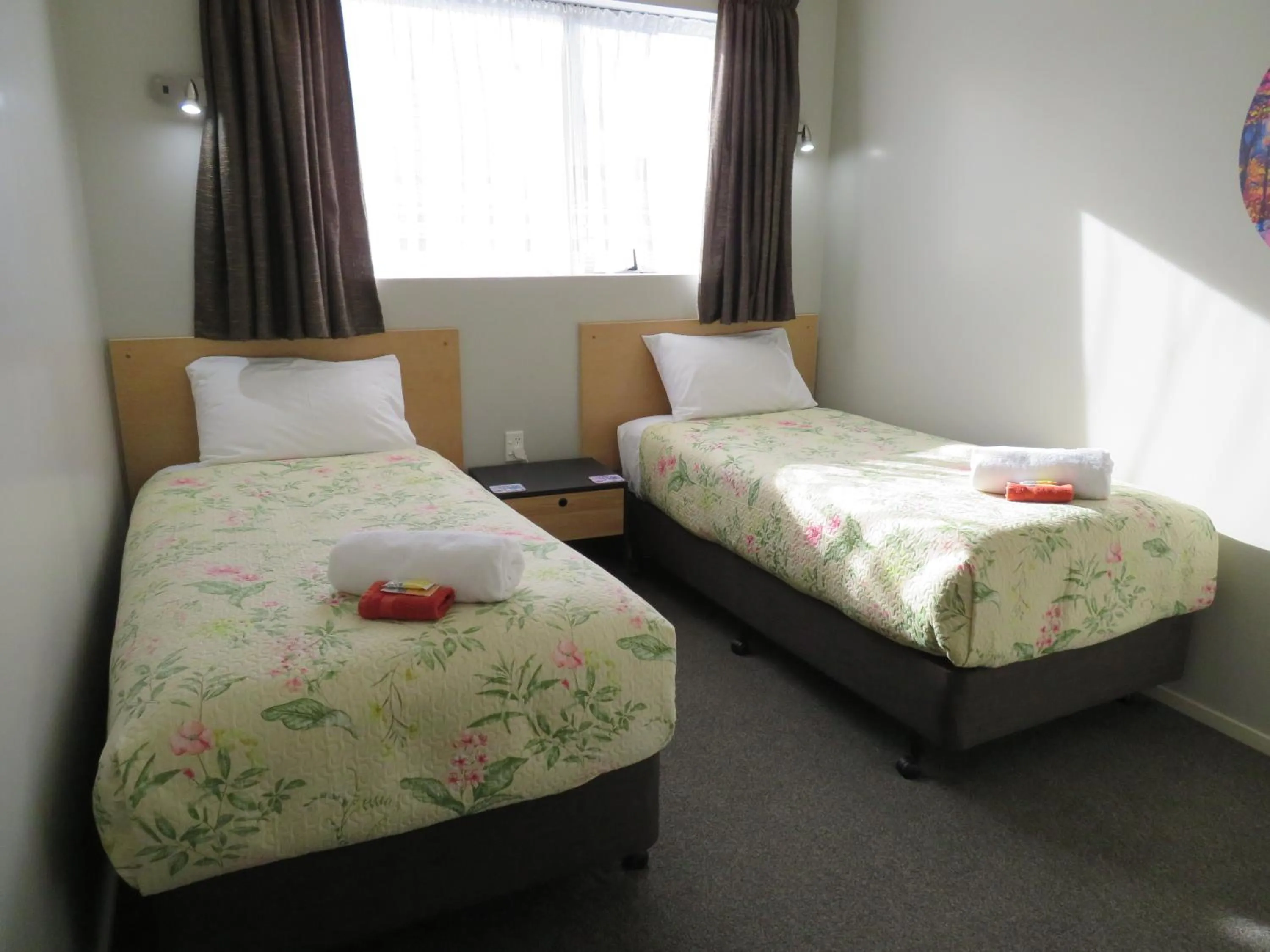 Bed in Commodore Court Motel