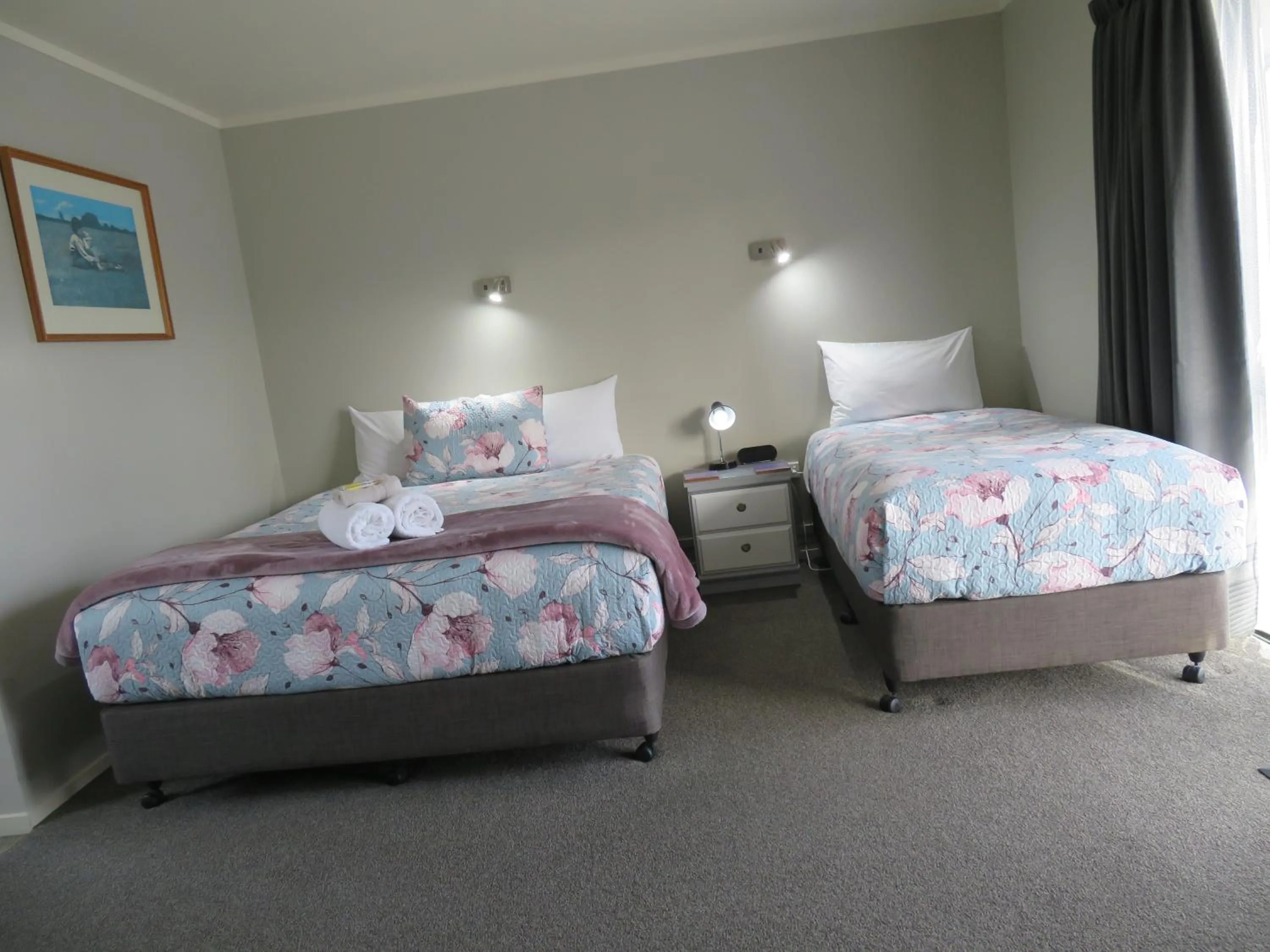 Bed in Commodore Court Motel