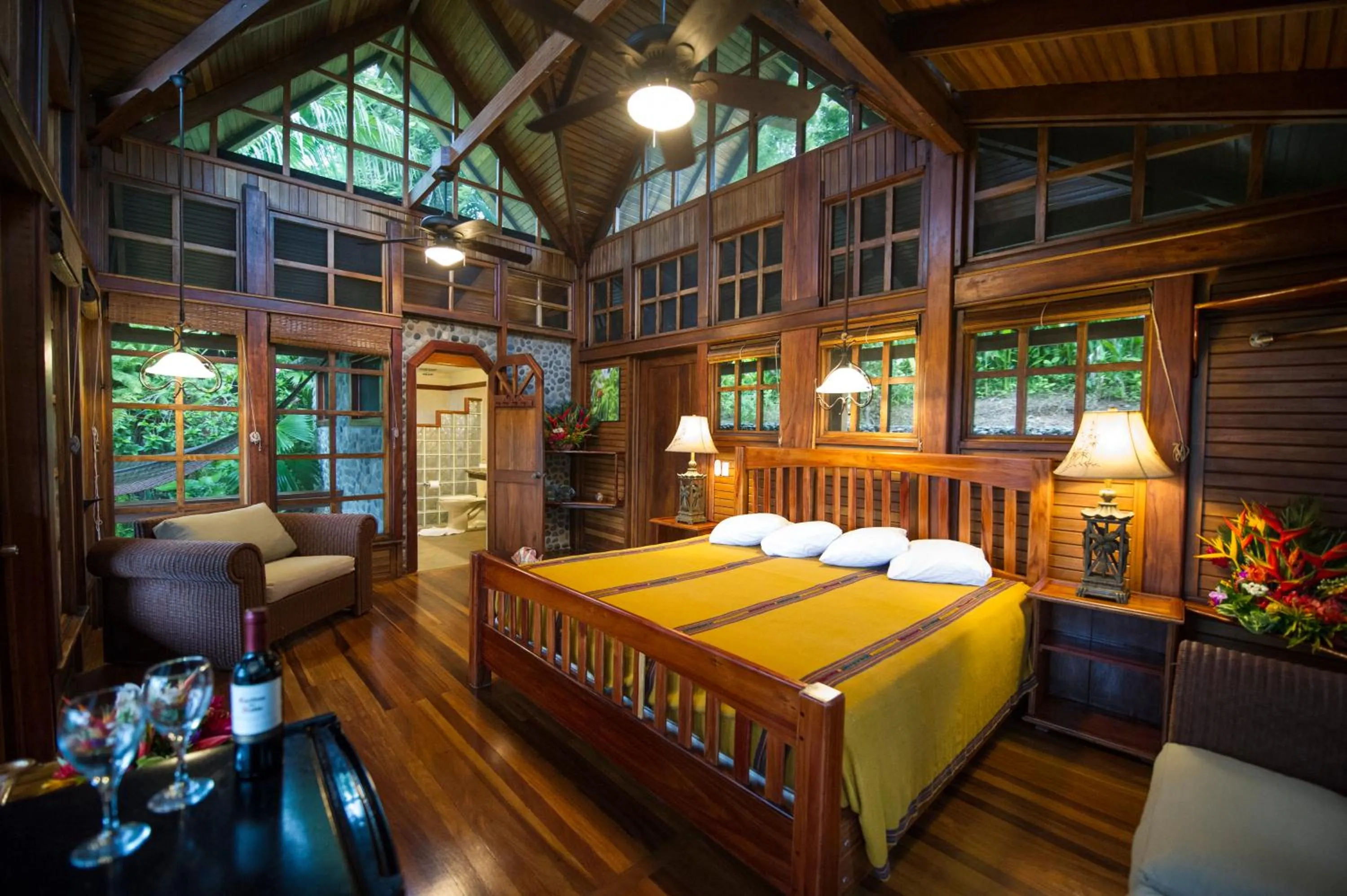 Bed in Aguila de Osa Rainforest Lodge