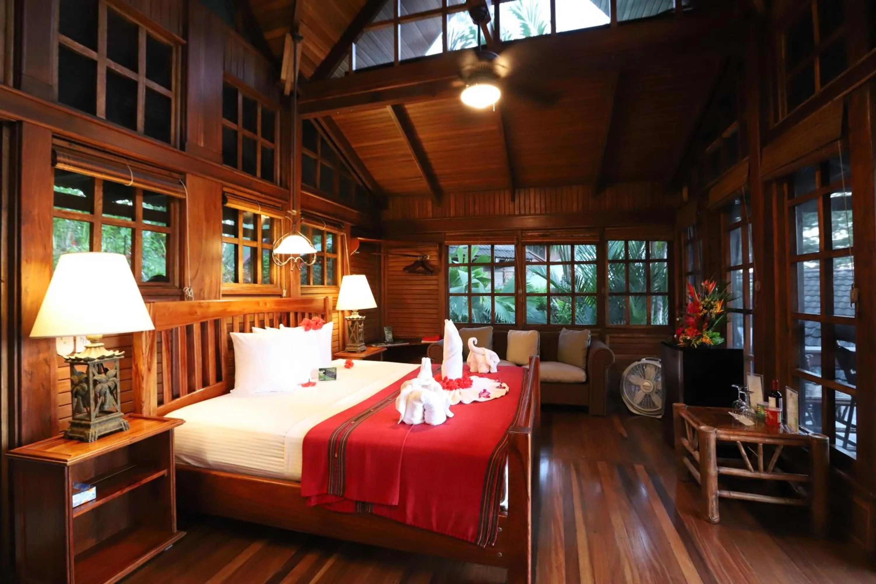 Bed in Aguila de Osa Rainforest Lodge