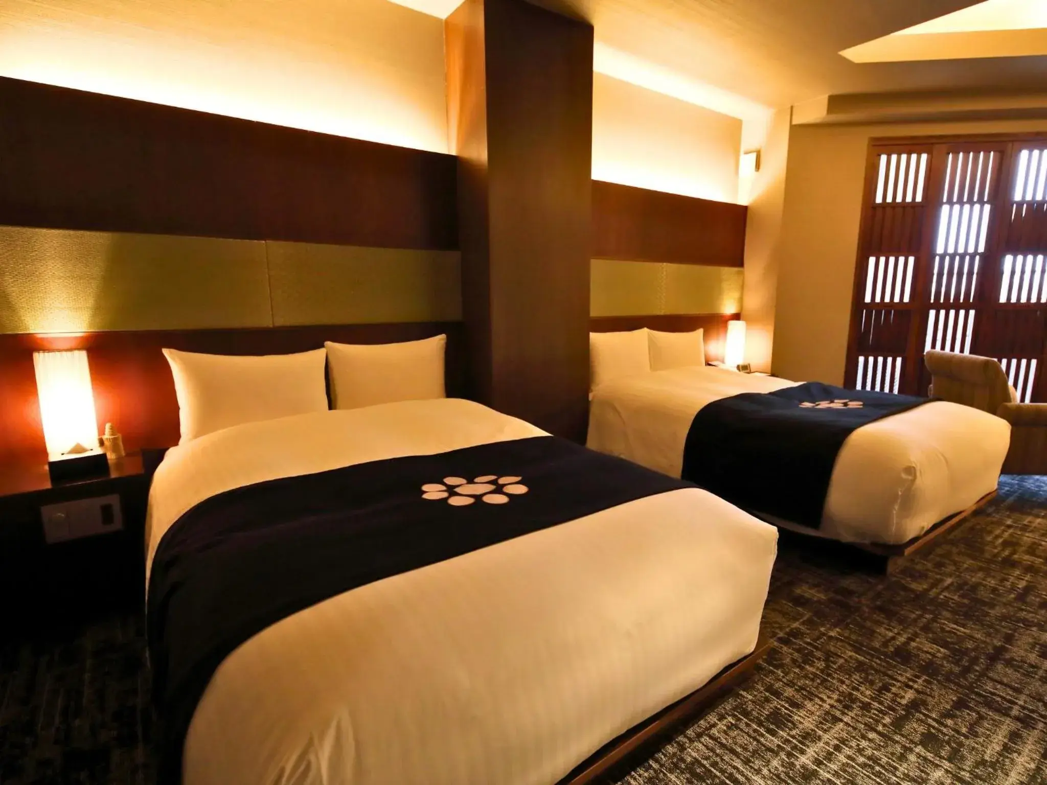 Bed in Ryotei Matsuya Honkan Suizenji Bed in Ryotei Matsuya Honkan Suizenji