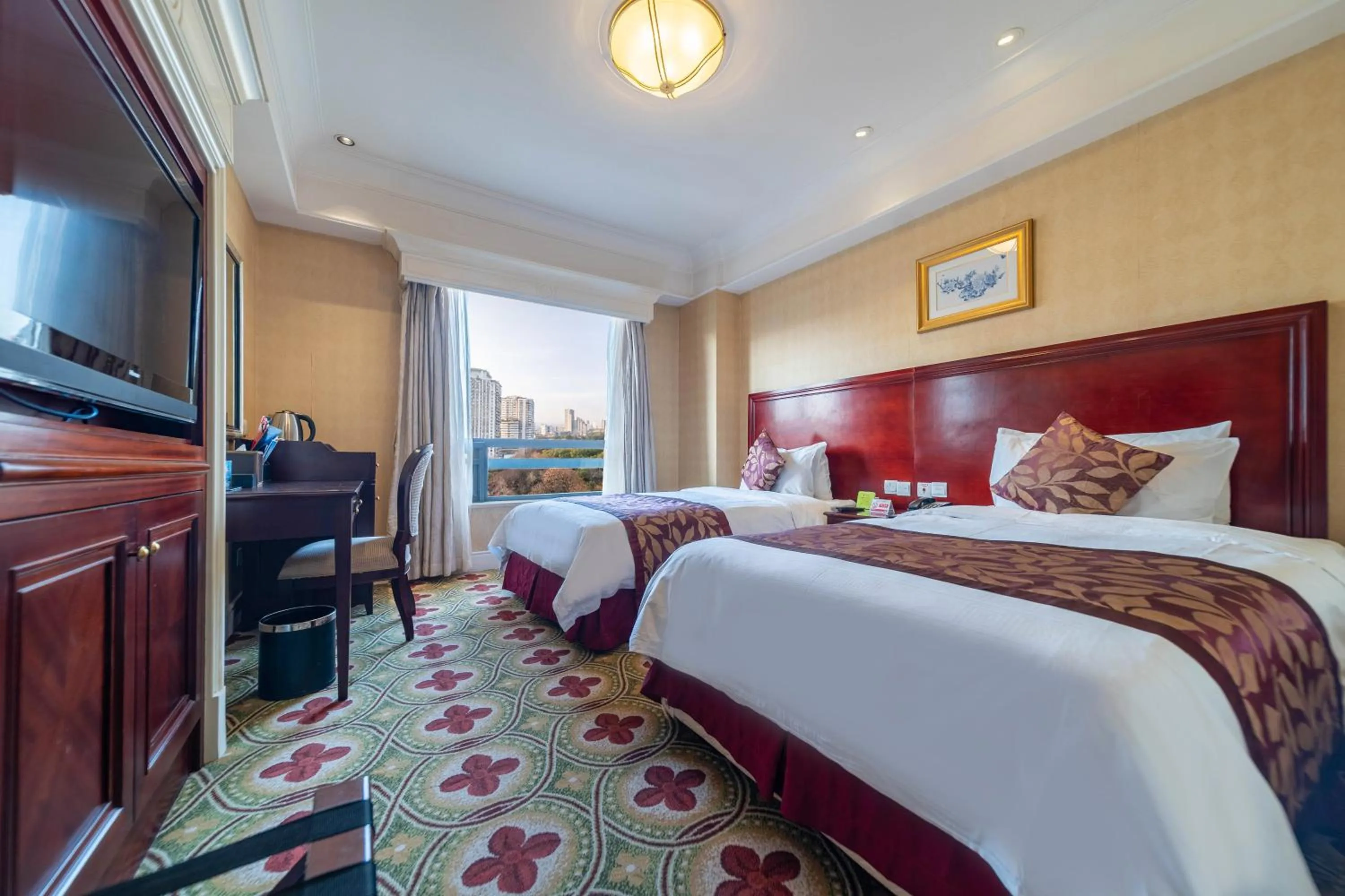 Bed in Ramada Yichang Hotel