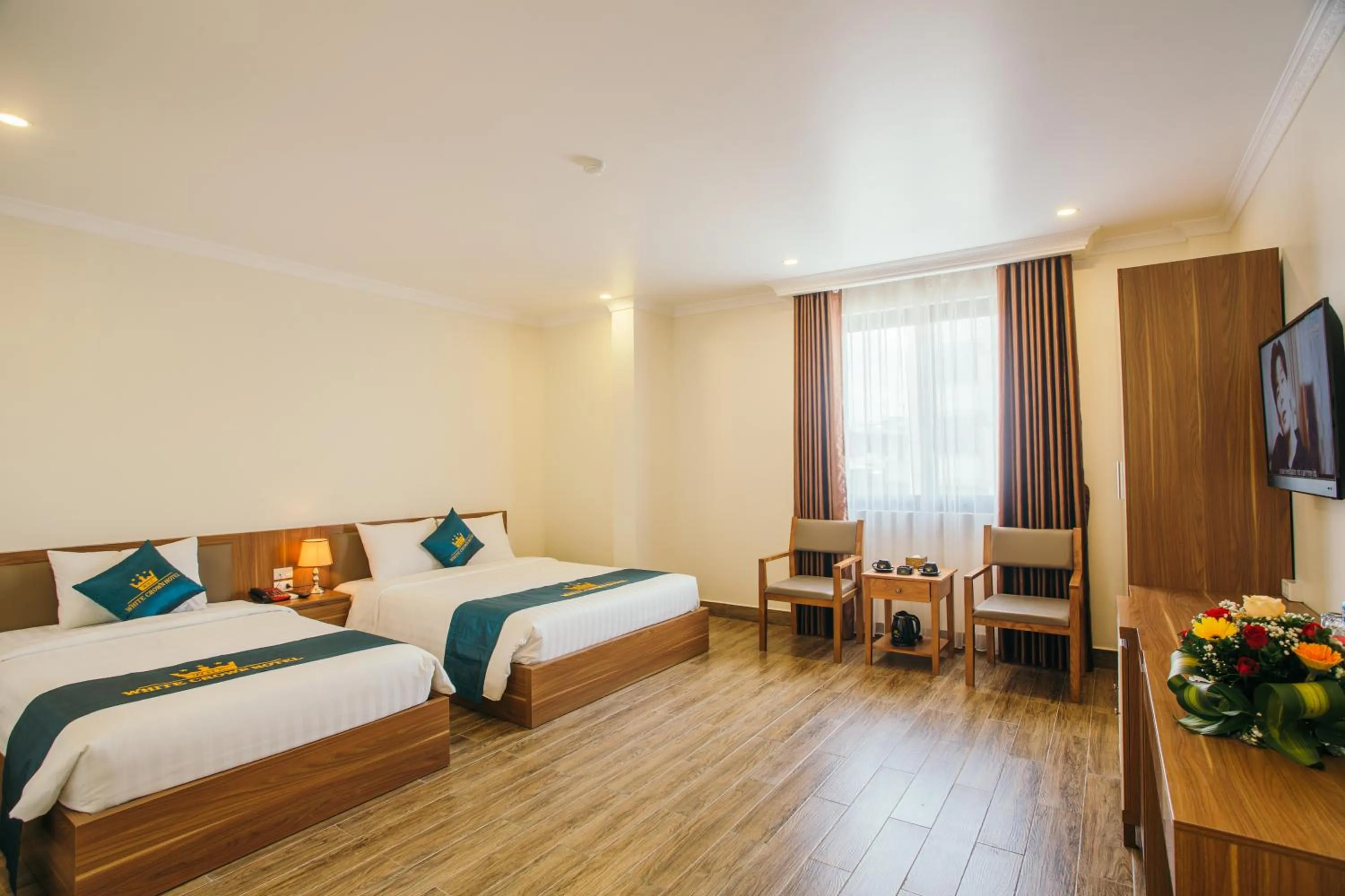 Bed in White Crown Hotel