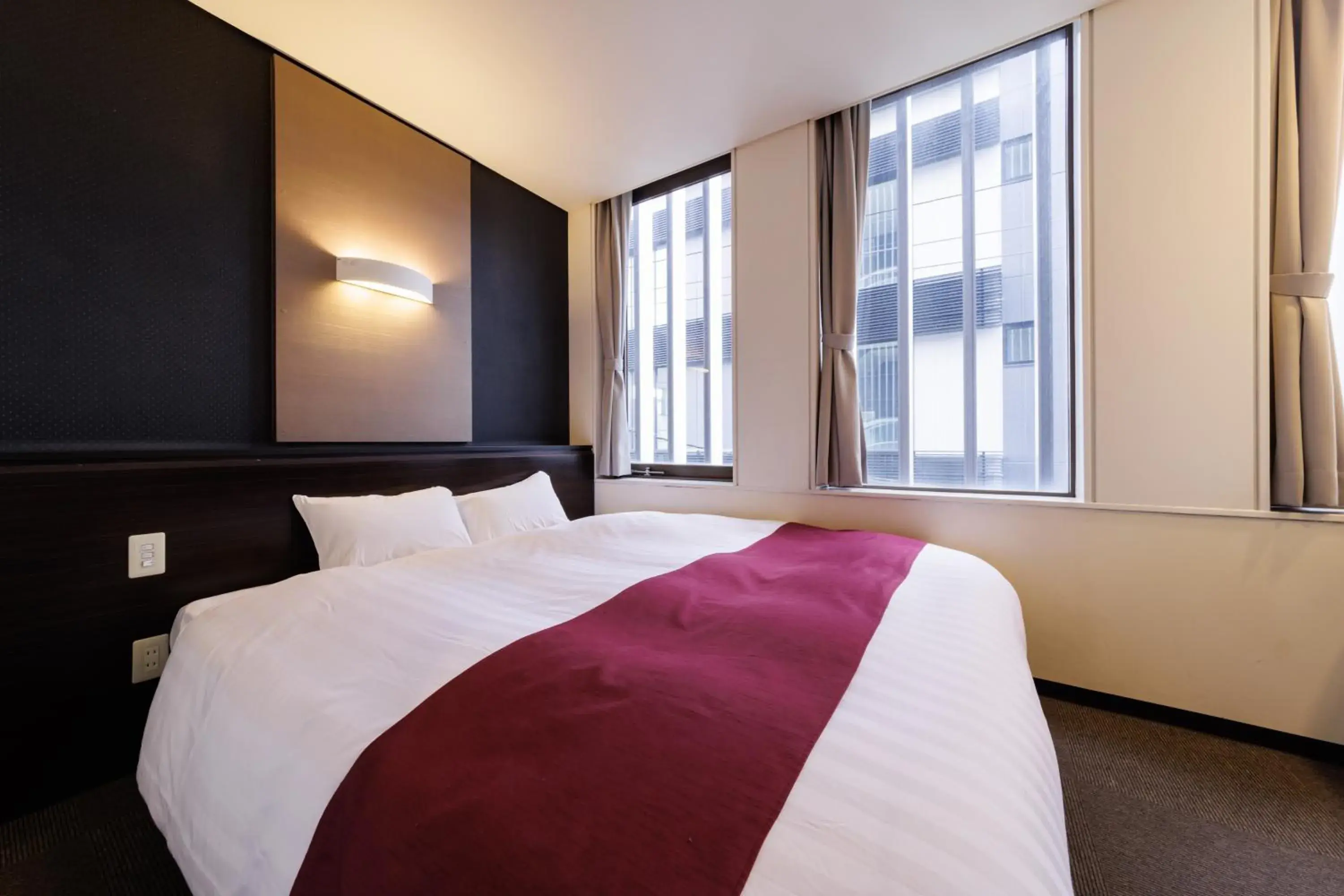 Bed in Hotel Fosse Himeji Bed in Hotel Fosse Himeji