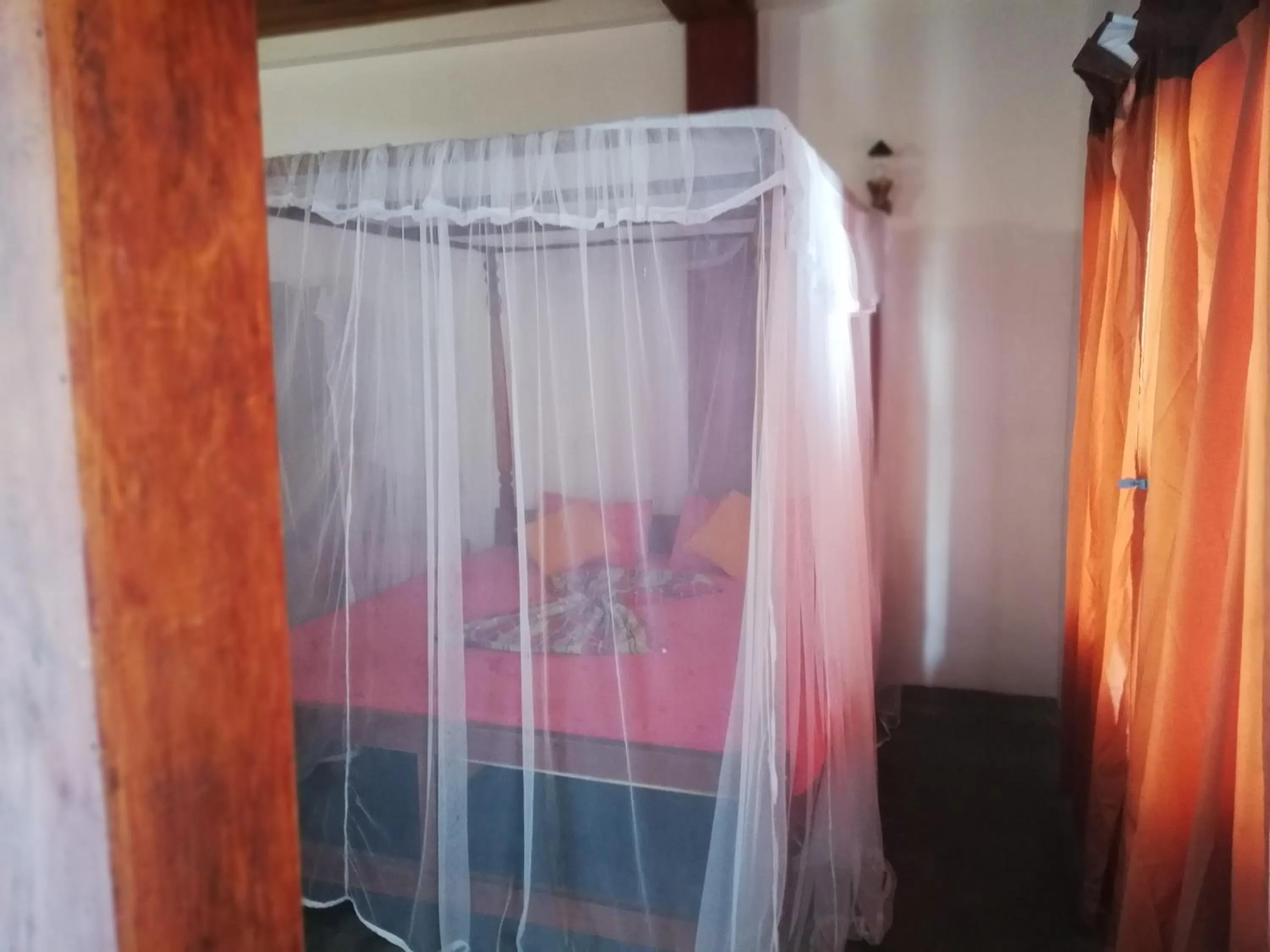 Bed in Sunset Colony Beach Resort