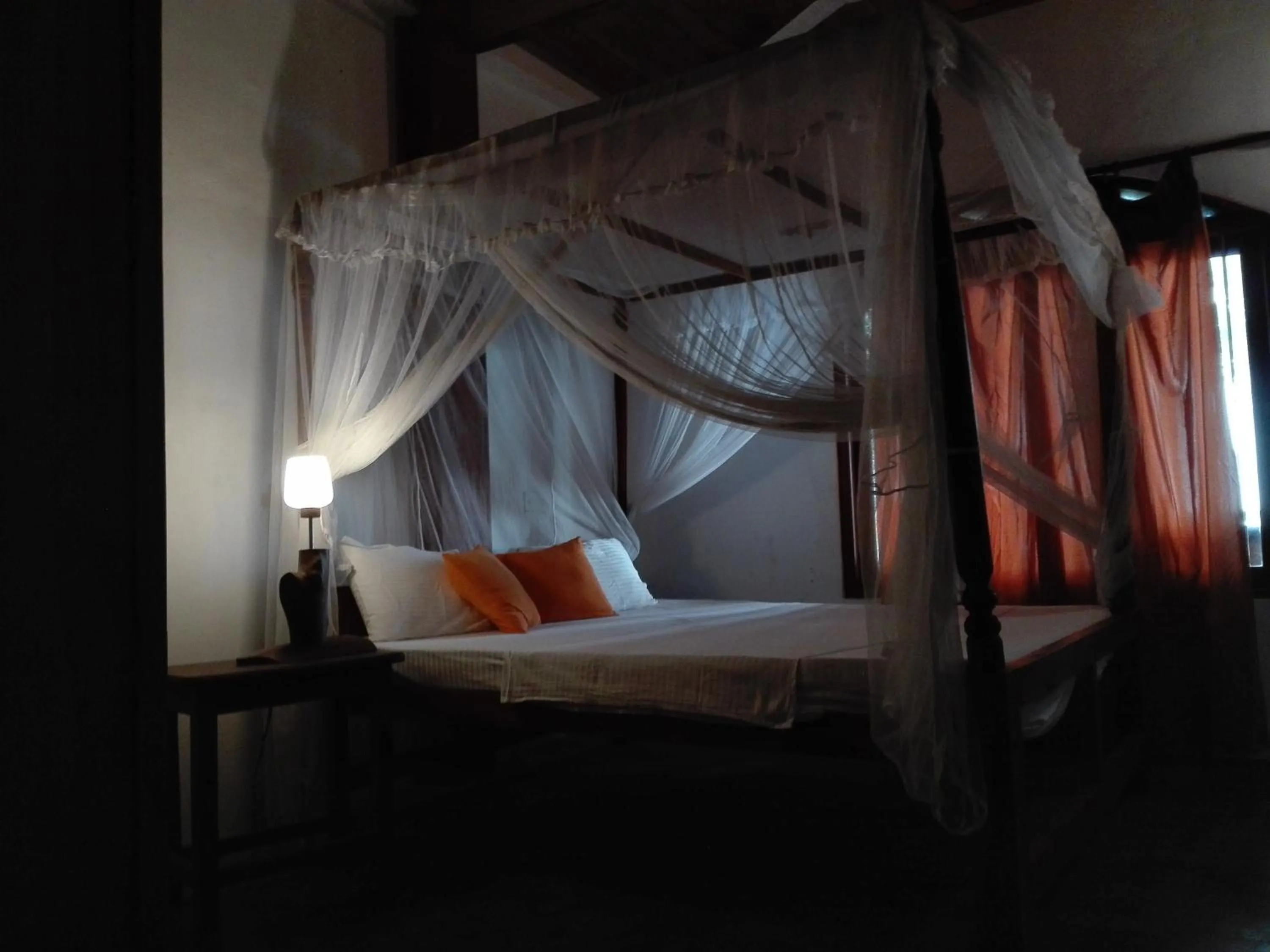 Bed in Sunset Colony Beach Resort
