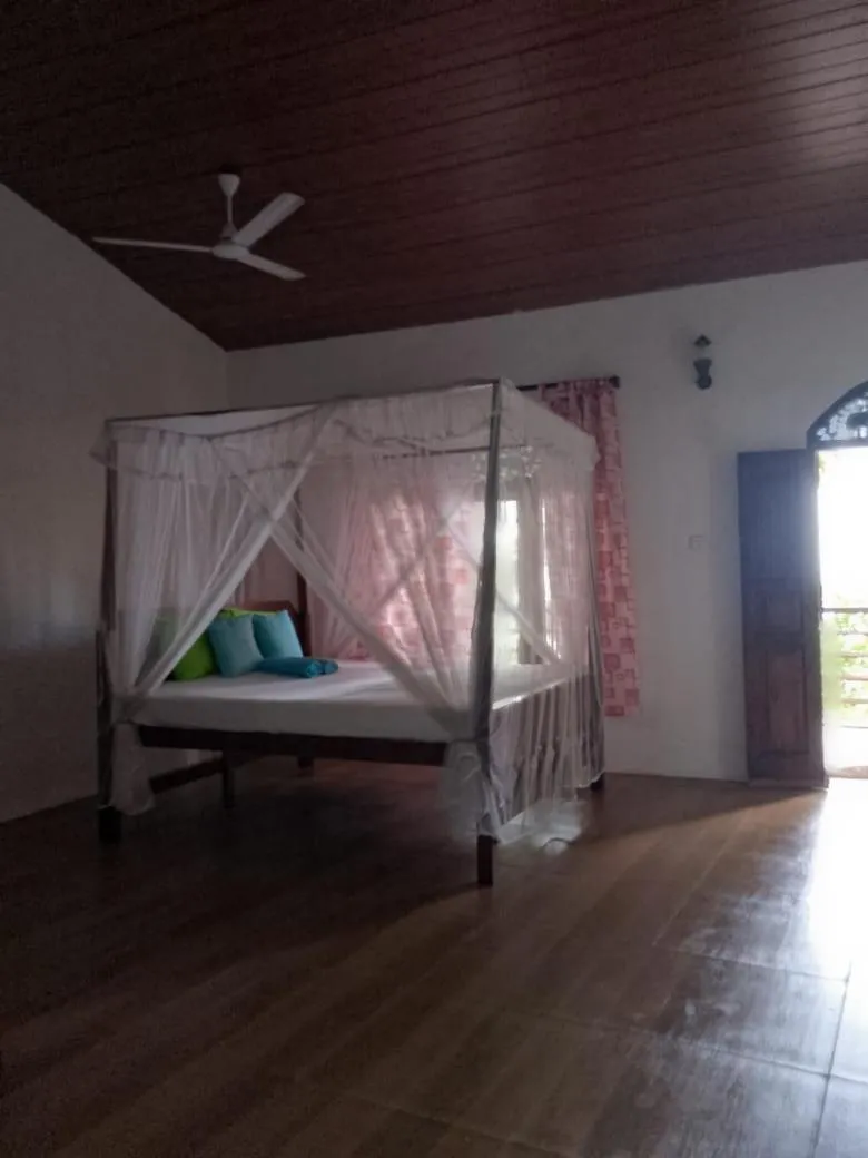 Bed in Sunset Colony Beach Resort