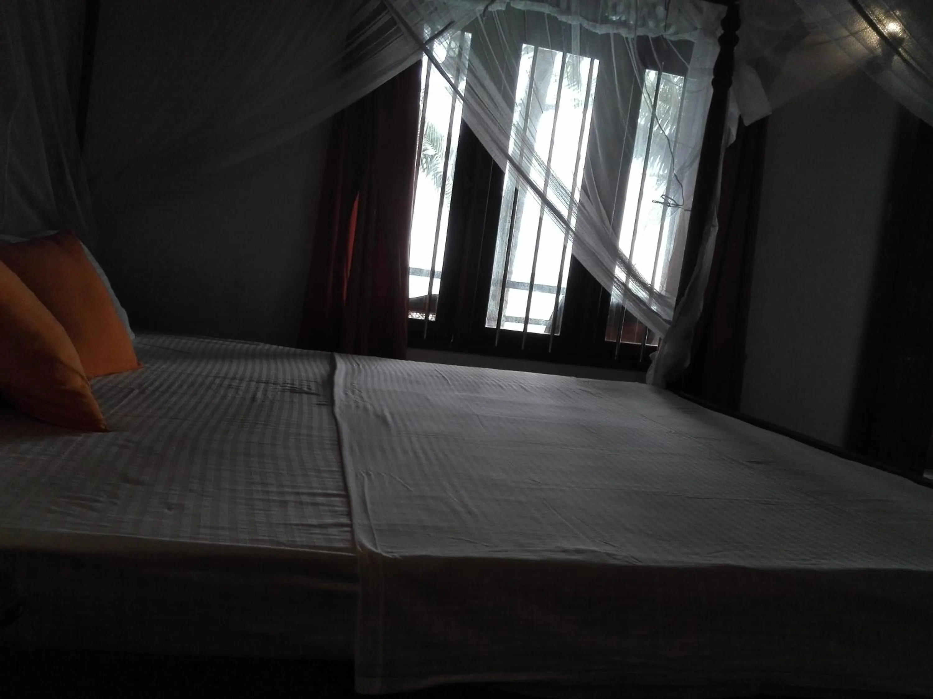 Bed in Sunset Colony Beach Resort