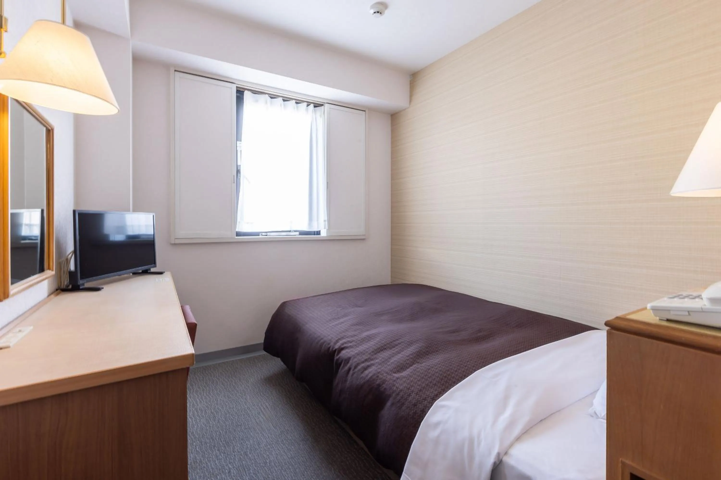 Bed in Ace Inn Matsumoto